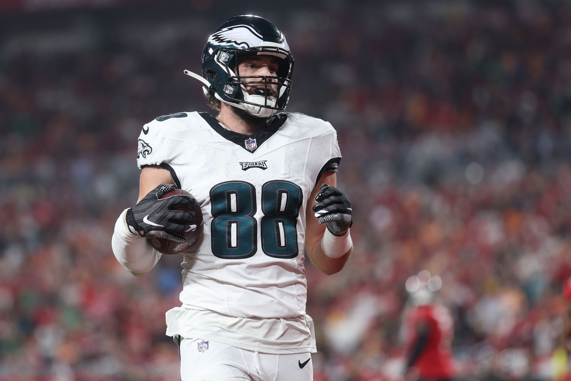 Philadelphia Eagles tight end Dallas Goedert (88) scores a touchdown against the Tampa Bay Buccaneers after a reception during the first half of a 2024 NFC wild card game at Raymond James Stadium.