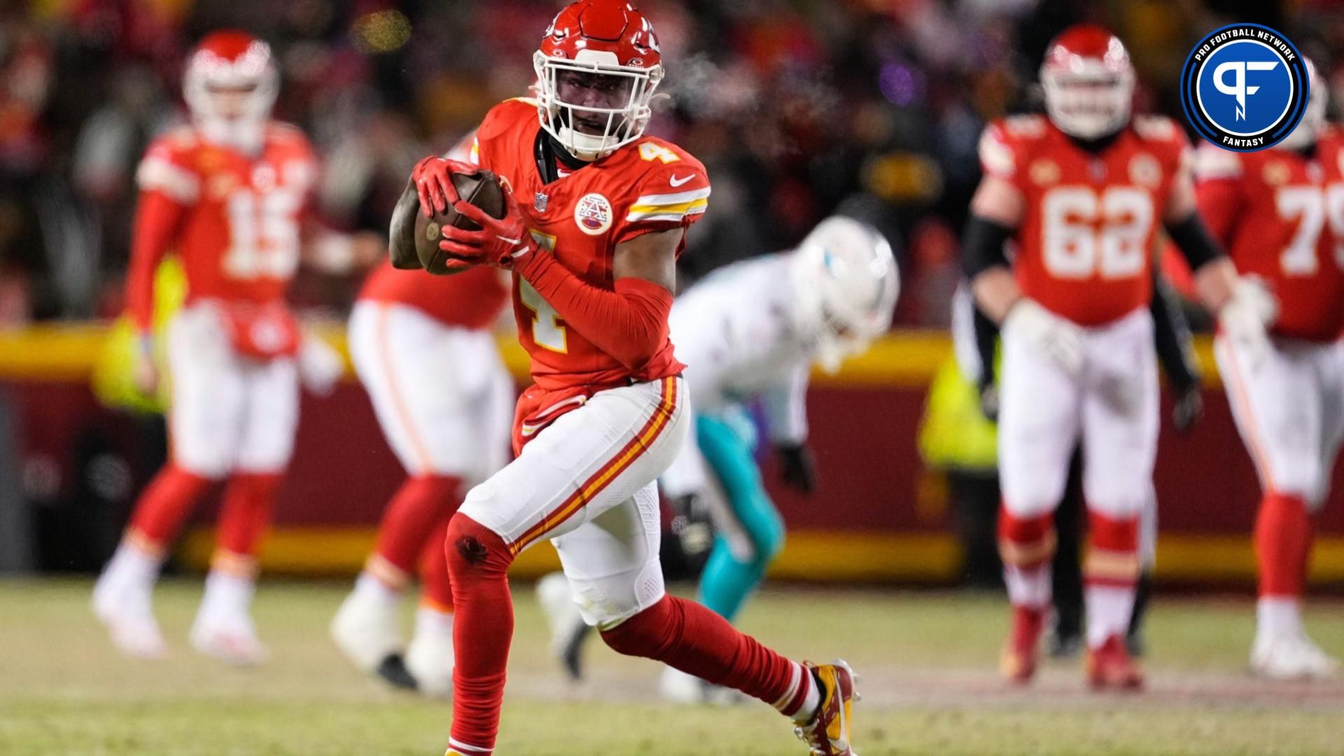 Kansas City Chiefs wide receiver Rashee Rice (4) runs the ball against the Miami Dolphins during the second half of the 2024 AFC wild card game at GEHA Field at Arrowhead Stadium.