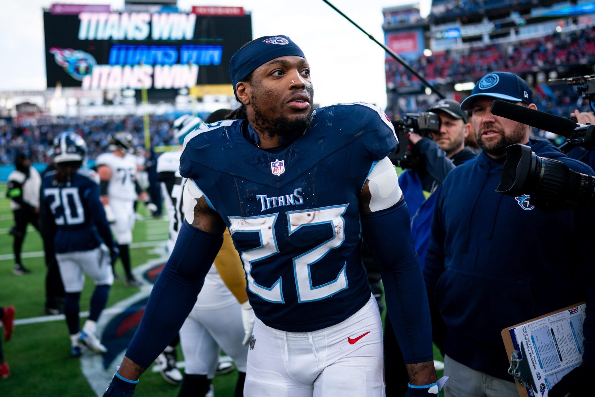 Tennessee Titans RB Derrick Henry (22) exits the field after defeating Jacksonville Jaguars.