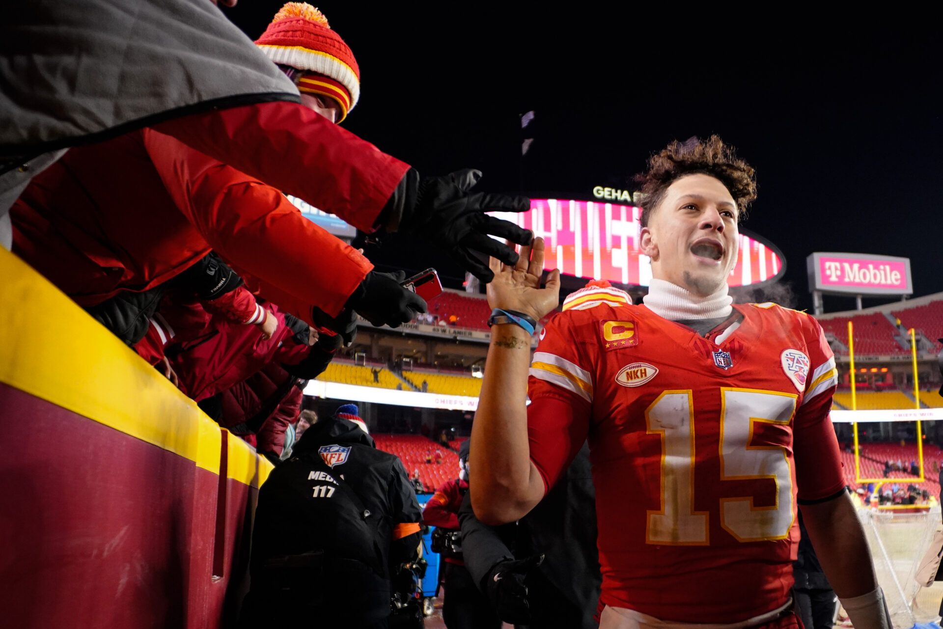 Kansas City Chiefs quarterback Patrick Mahomes (15) celebrates the victory against the Miami Dolphins following the 2024 AFC wild card game at GEHA Field at Arrowhead Stadium.
