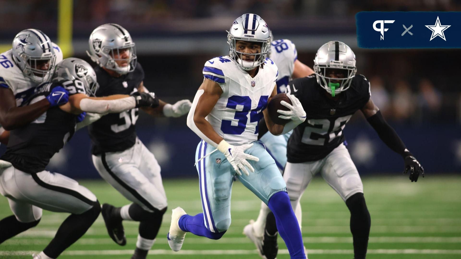 Dallas Cowboys running back Malik Davis (34) runs the ball against the Las Vegas Raiders in the first quarter at AT&T Stadium.