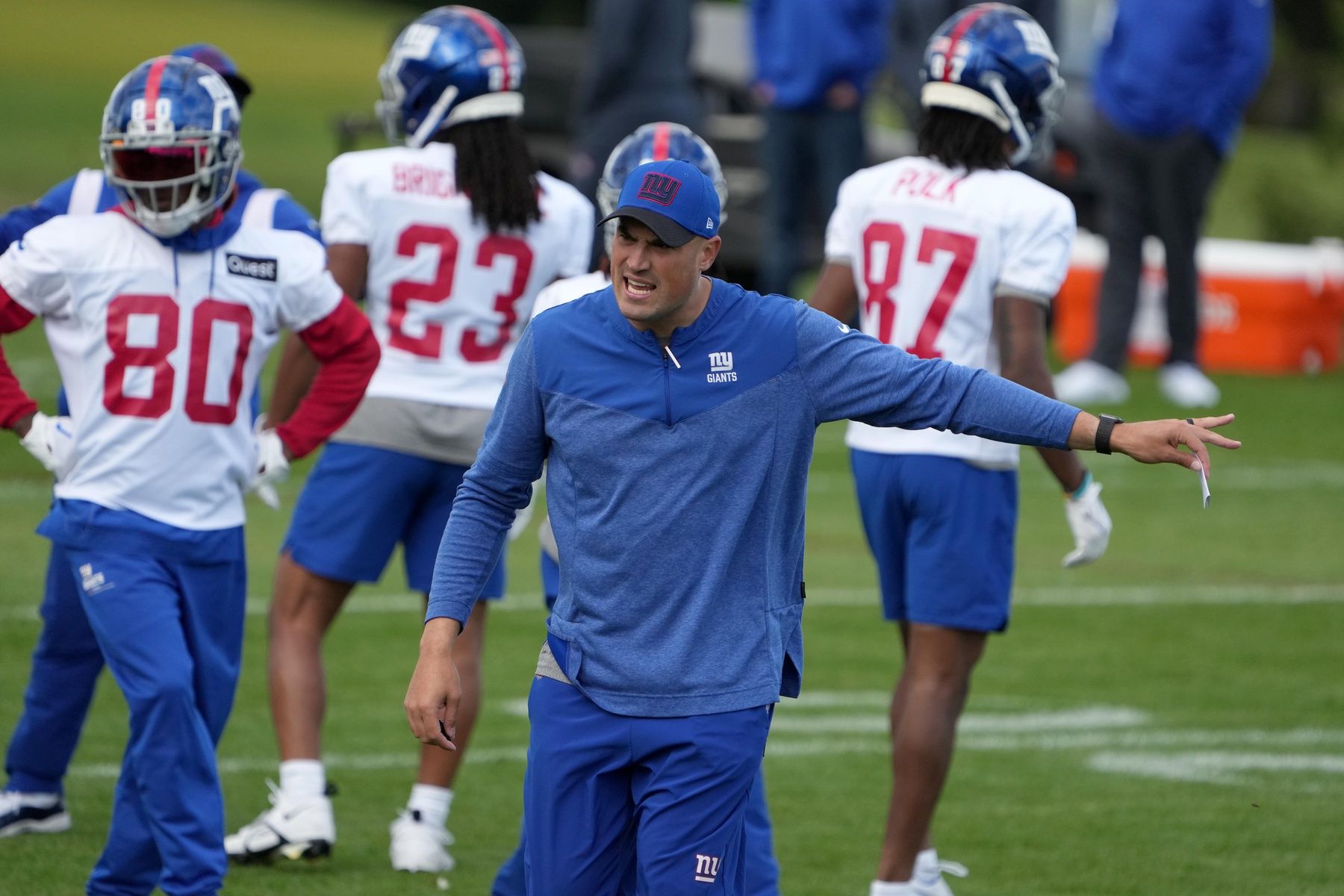 New York Giants offensive coordinator Mike Kafka reacts during practice at Hanbury Manor.