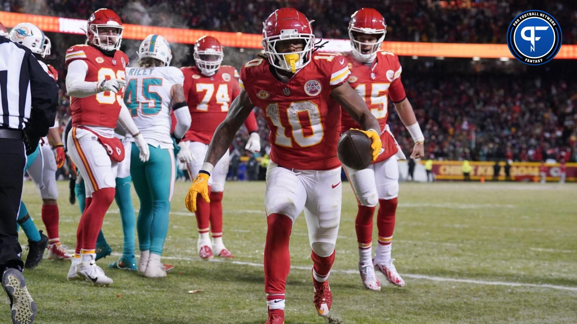 Kansas City Chiefs running back Isiah Pacheco (10) celebrates his touchdown scored against the Miami Dolphins with quarterback Patrick Mahomes (15) during the second half of the 2024 AFC wild card game at GEHA Field at Arrowhead Stadium.