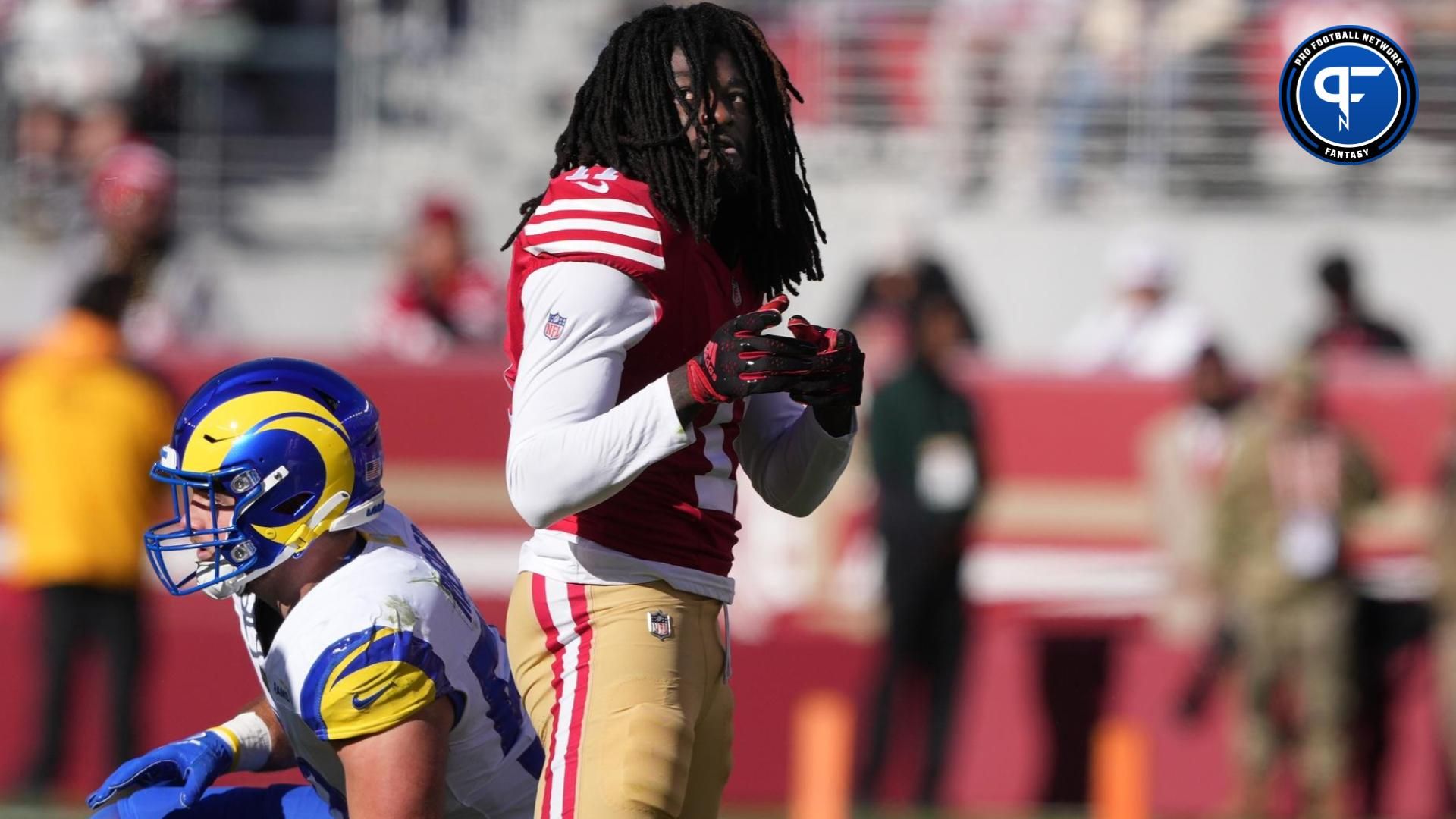 San Francisco 49ers wide receiver Brandon Aiyuk (11) gestures after catching a pass for a first down against the Los Angeles Rams during the first quarter at Levi's Stadium.