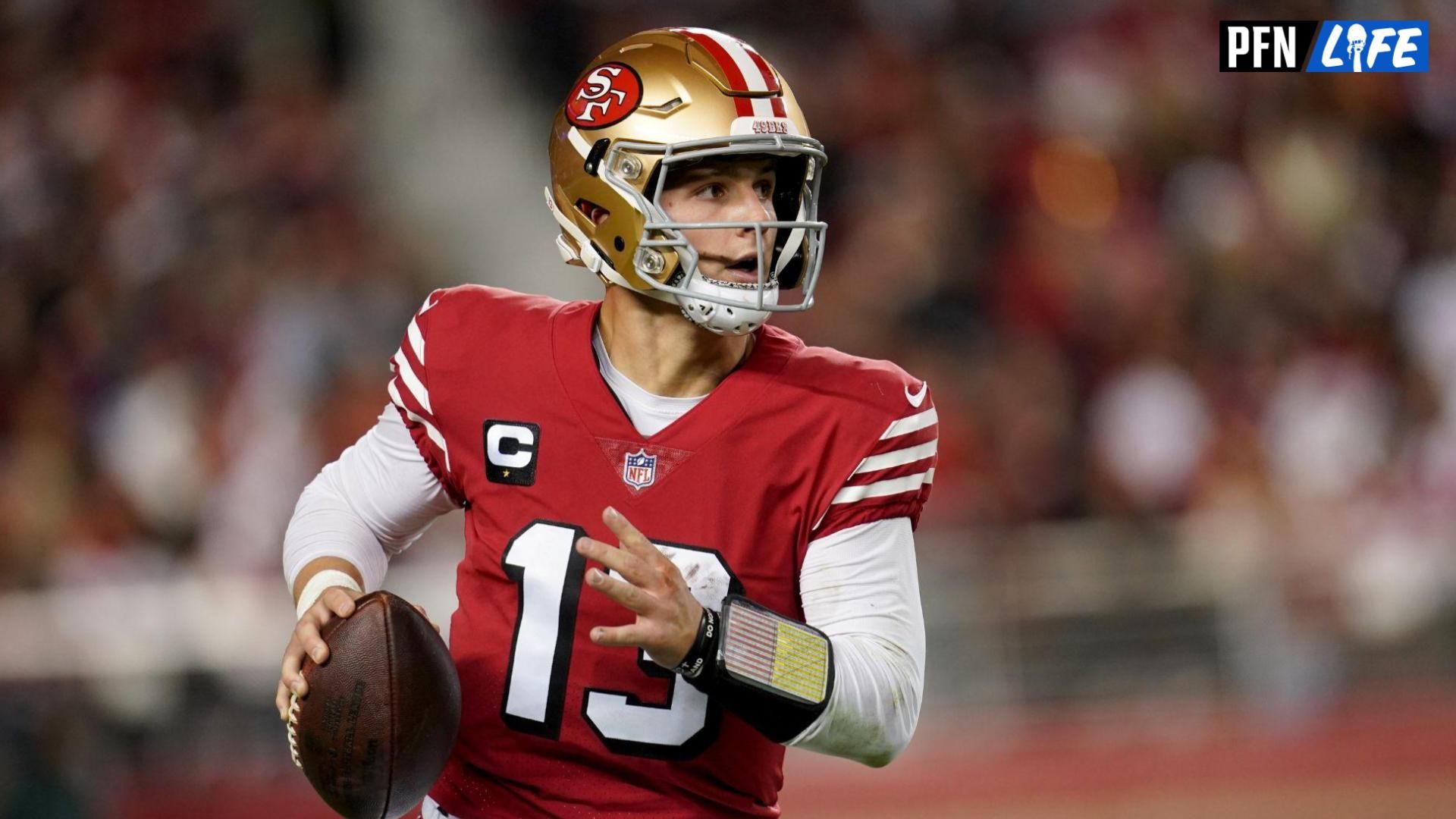 San Francisco 49ers quarterback Brock Purdy (13) runs the ball against the Baltimore Ravens in the fourth quarter at Levi's Stadium.