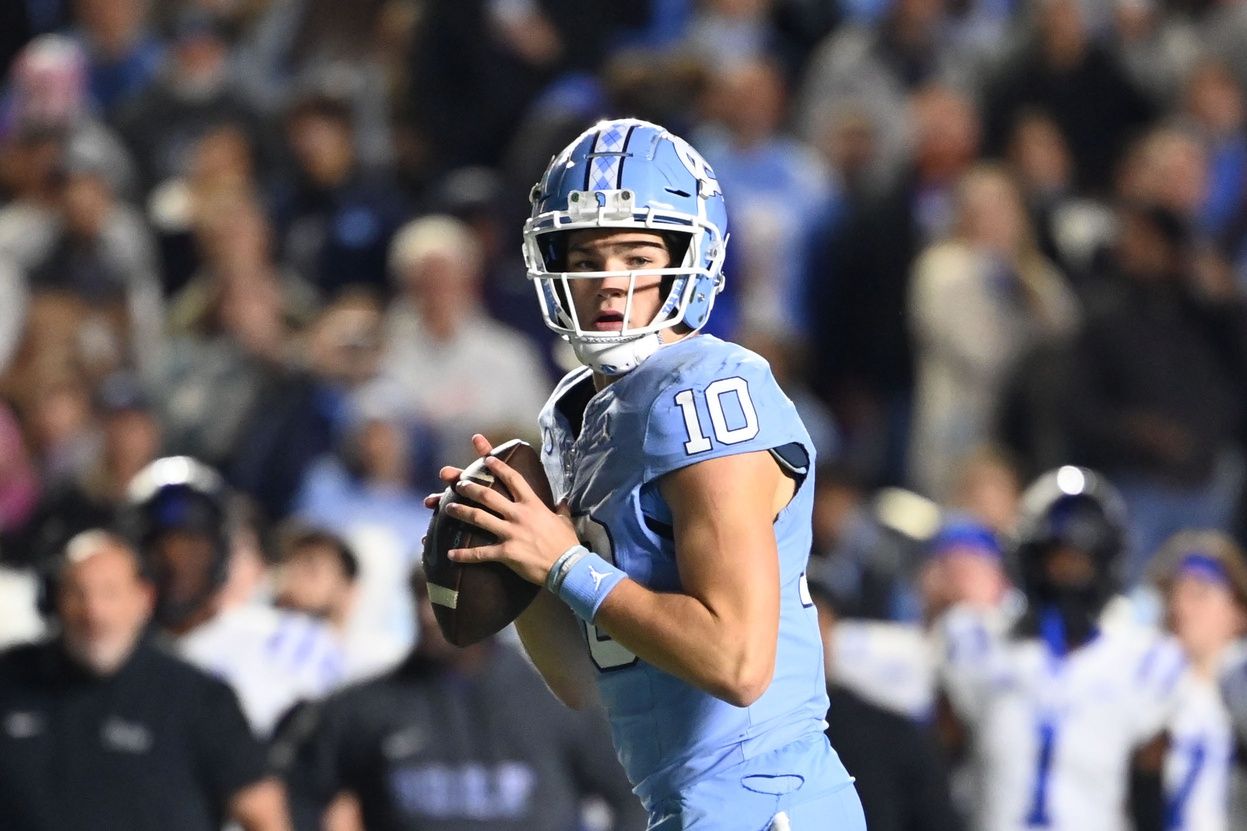 North Carolina Tar Heels quarterback Drake Maye (10)***North Carolina Tar Heels defensive lineman Desmond Evans (10) looks to pass in the second quarter at Kenan Memorial Stadium.