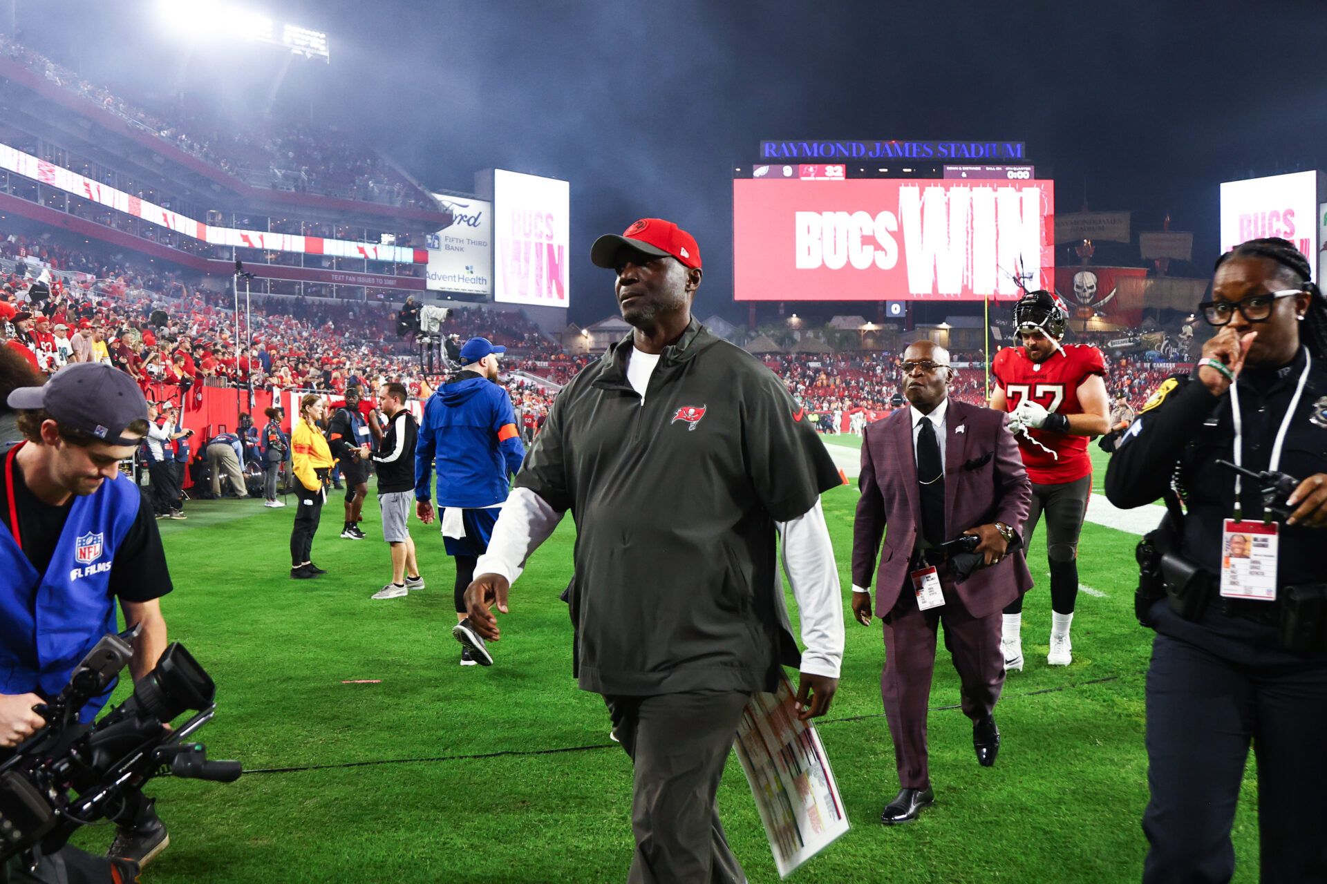 Tampa Bay Buccaneers head coach Todd Bowles leaves the field after a victory against the Philadelphia Eagles in a 2024 NFC wild card game at Raymond James Stadium.