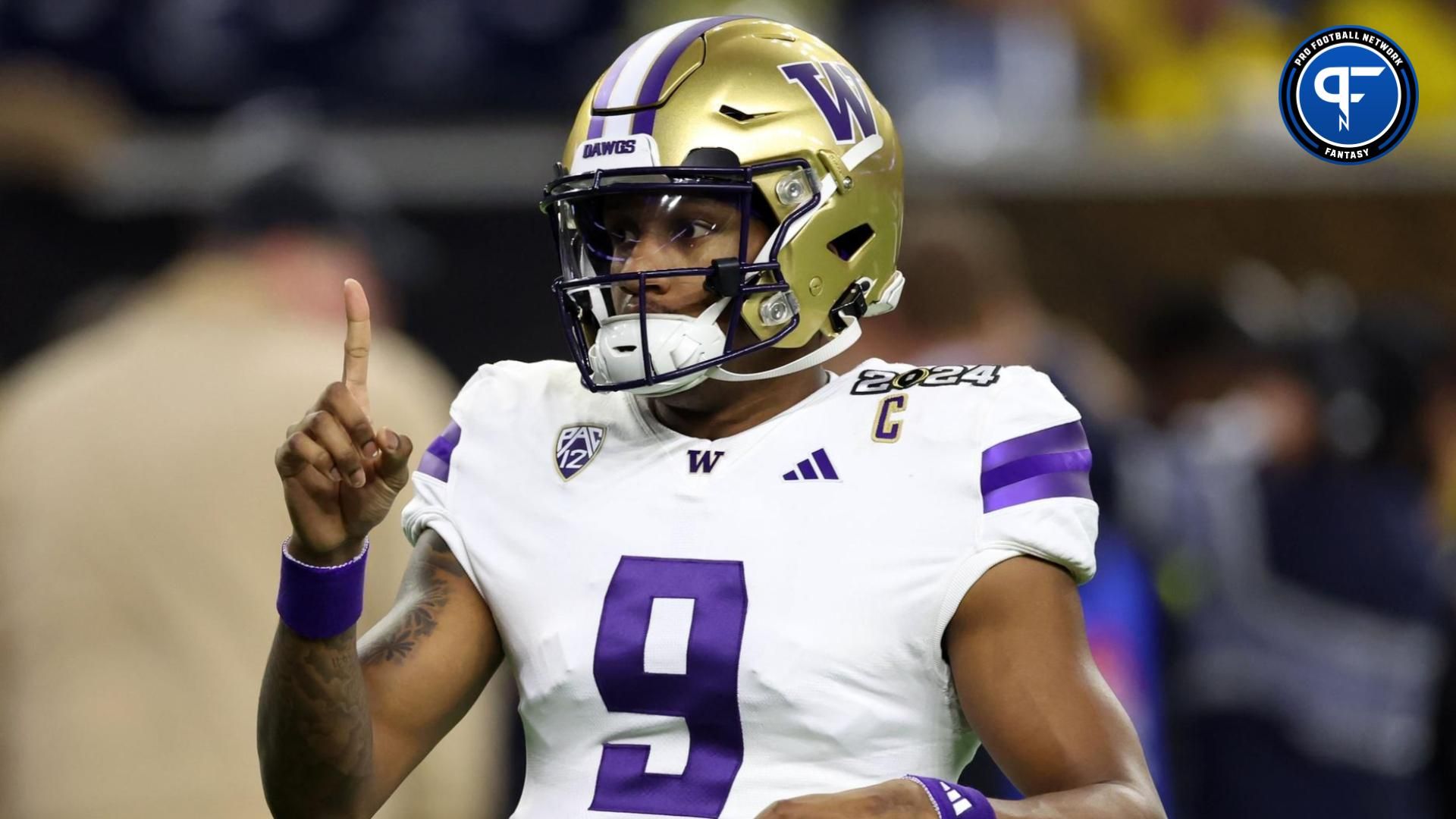 Washington Huskies quarterback Michael Penix Jr. (9) during warmups before the start of the 2024 College Football Playoff national championship game at NRG Stadium.