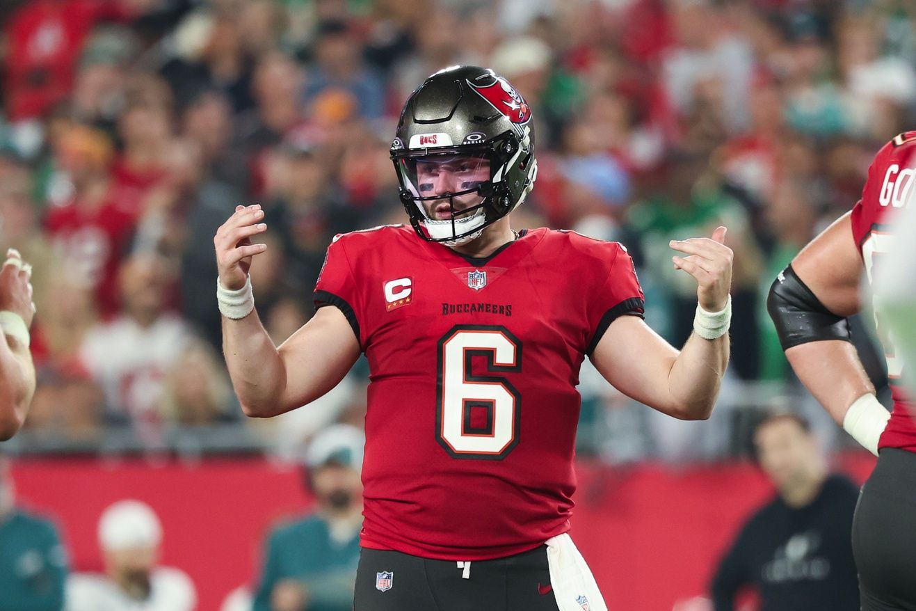 Tampa Bay Buccaneers quarterback Baker Mayfield (6) gestures before the snap against the Philadelphia Eagles during the first half of a 2024 NFC wild card game at Raymond James Stadium.