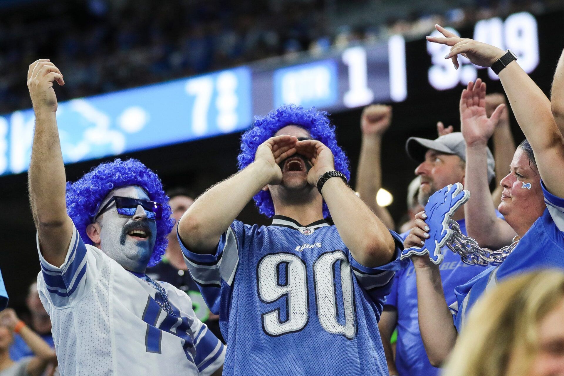 Detroit Lions fans cheer during the first half against the Seattle Seahawks at Ford Field in Detroit.