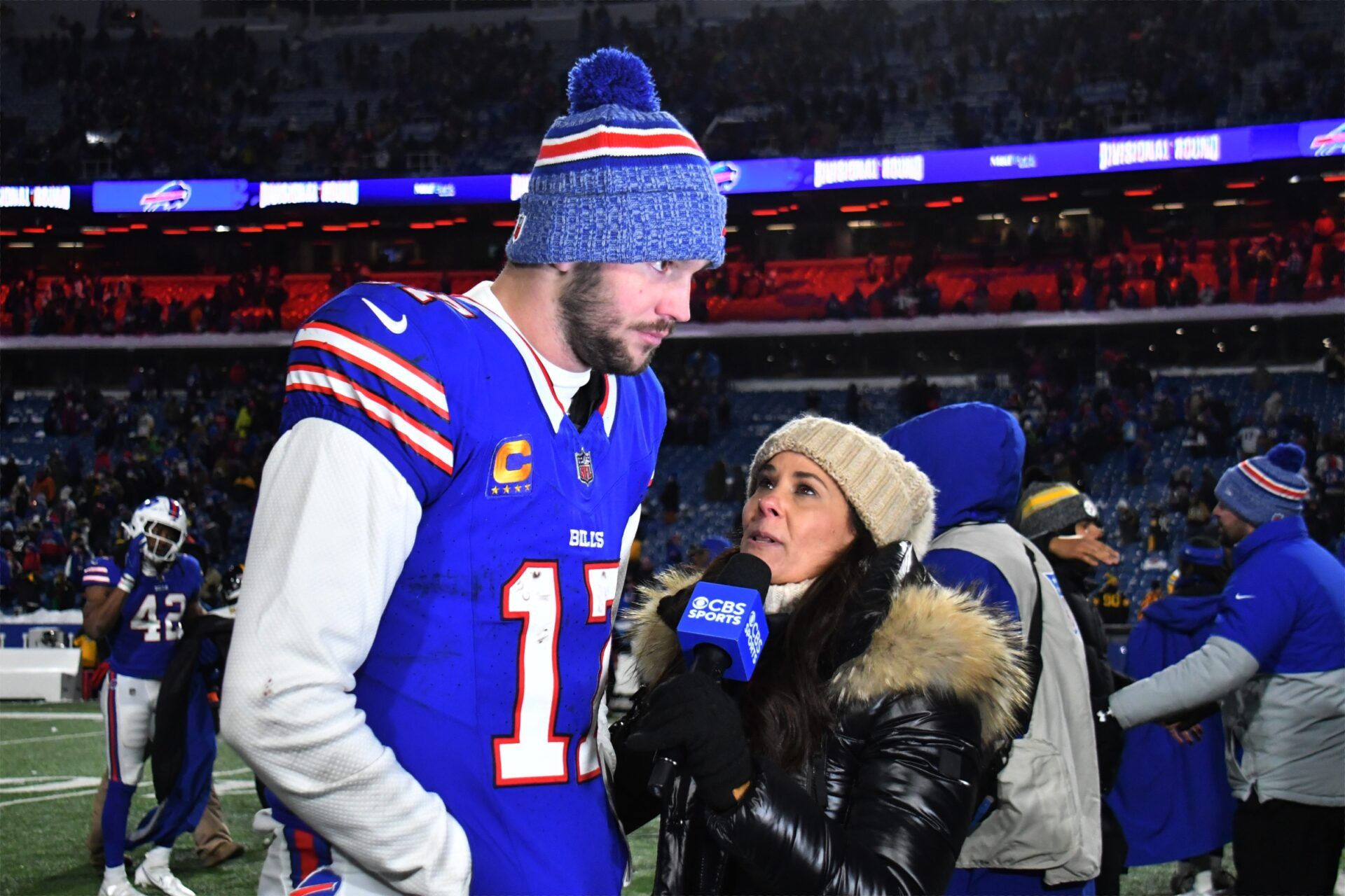 Buffalo Bills quarterback Josh Allen (17) takes interviews after defeating the Pittsburgh Steelers in a 2024 AFC wild card game at Highmark Stadium.