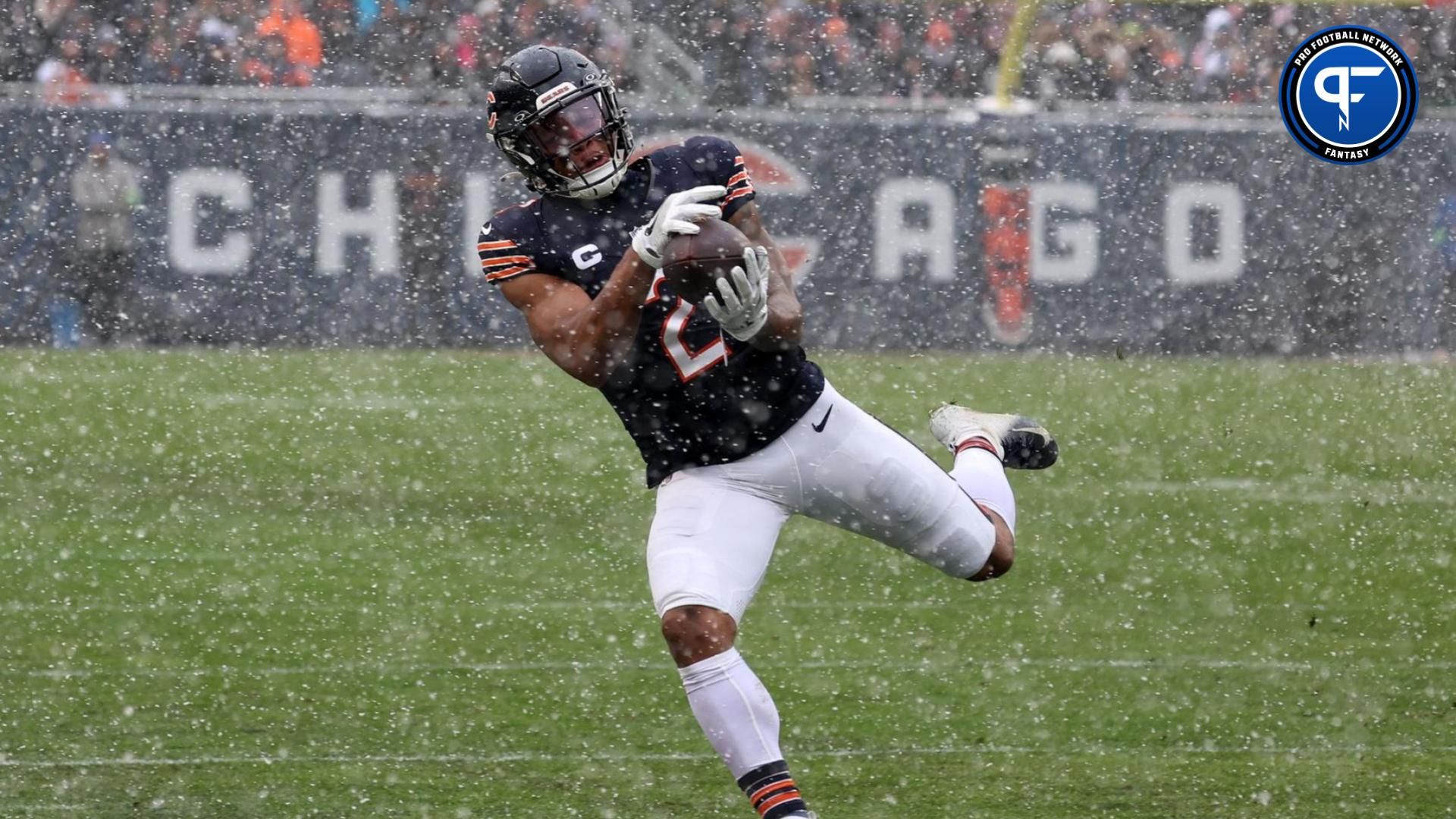 Chicago Bears wide receiver DJ Moore (2) makes a catch over the Atlanta Falcons during the first half at Soldier Field.