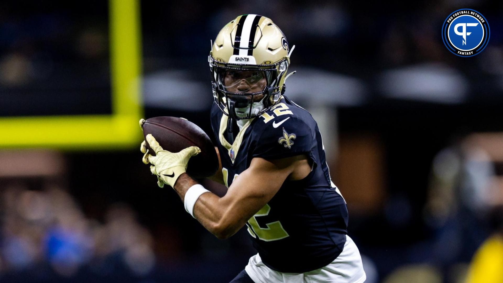 New Orleans Saints wide receiver Chris Olave (12) catches a pass against the Detroit Lions during the first half at the Caesars Superdome.