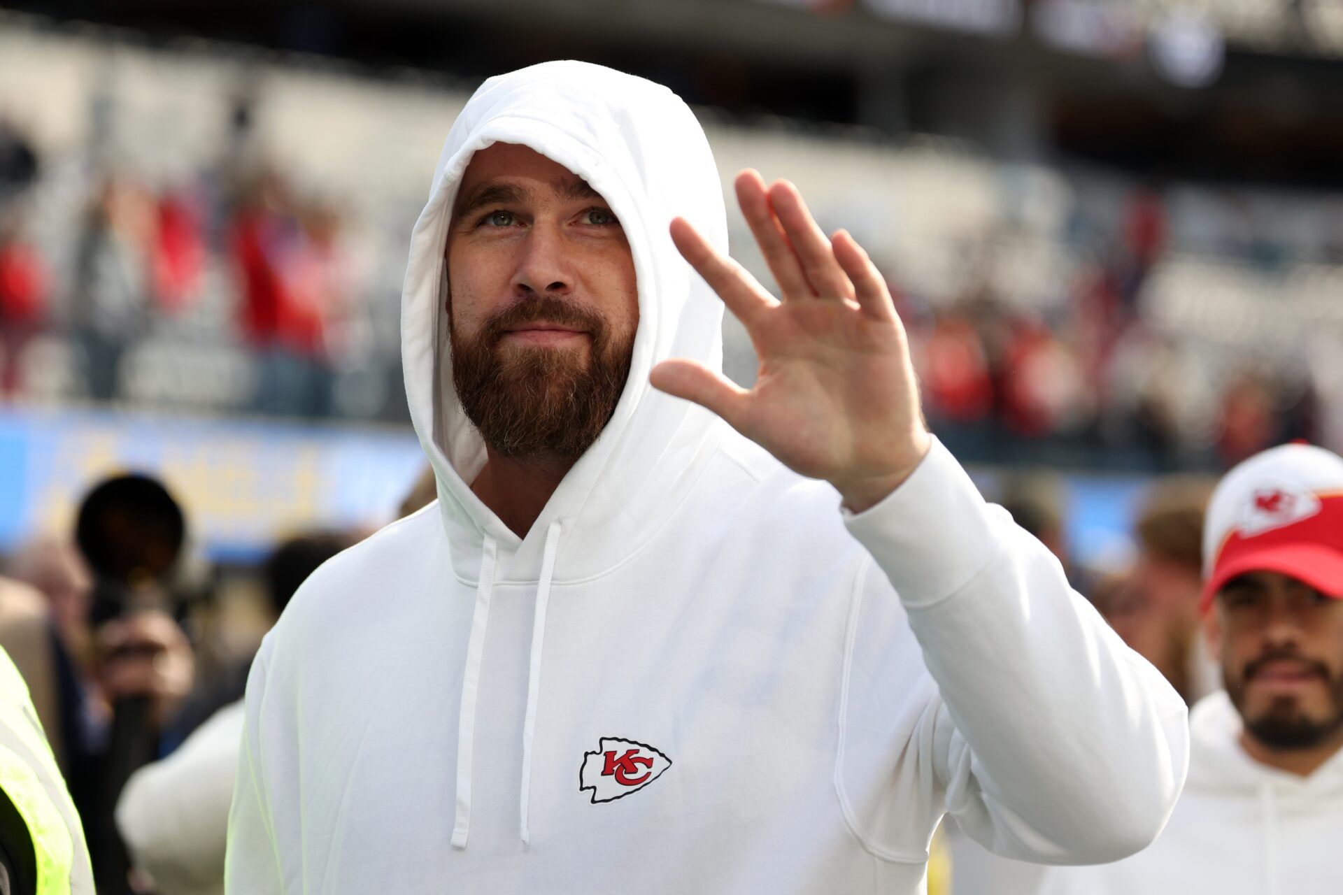 Kansas City Chiefs tight end Travis Kelce (87) waves to fans before the game against the Los Angeles Chargers at SoFi Stadium.