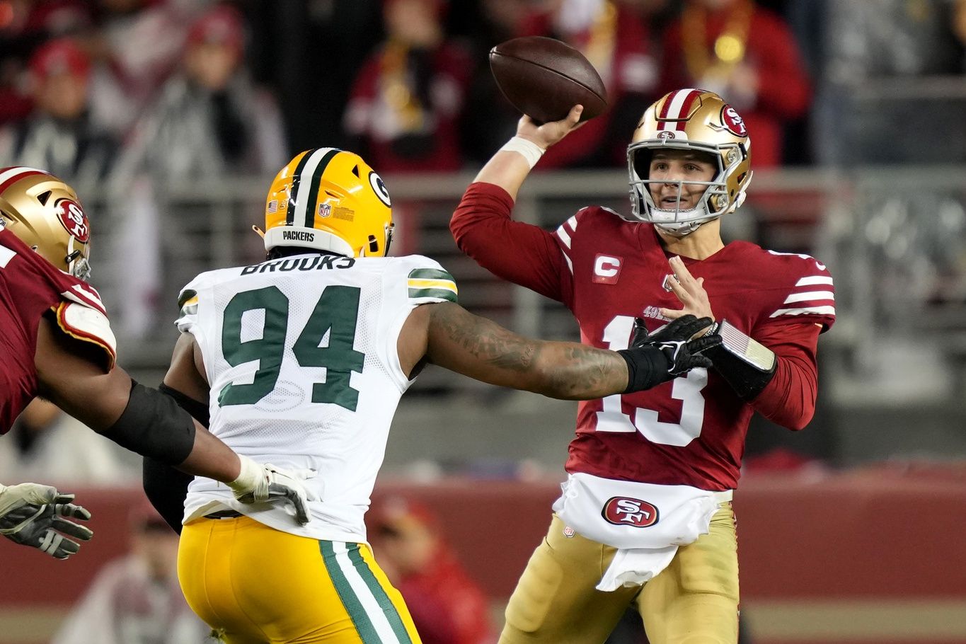 San Francisco 49ers QB Brock Purdy (13) passes the ball against the Green Bay Packers.