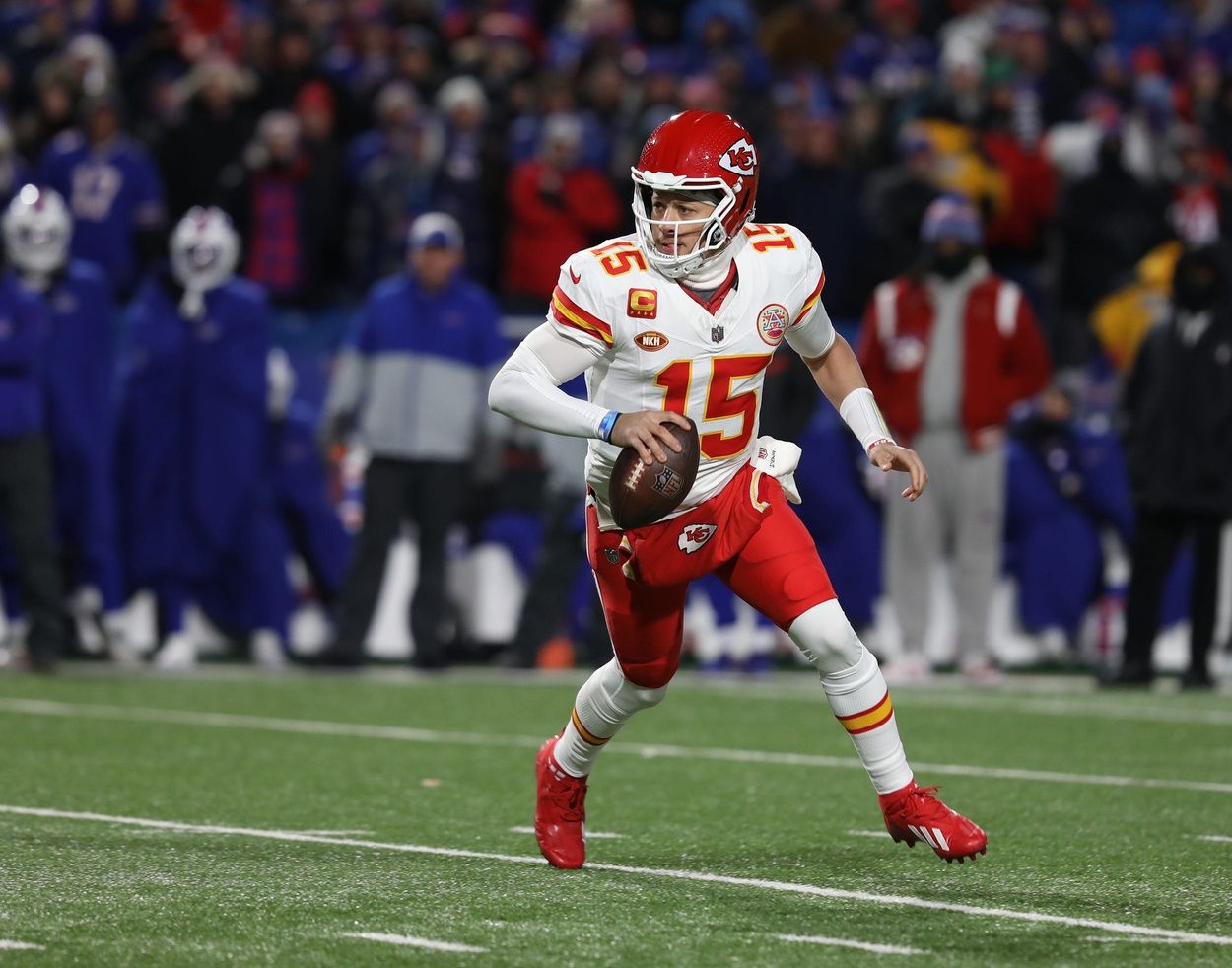 Chiefs quarterback Patrick Mahomes has an open area to move about as he looks for a receiver during the first half of the Bills divisional game against Kansas City Chiefs at Highmark Stadium in Orchard Park on Jan. 21, 2024.