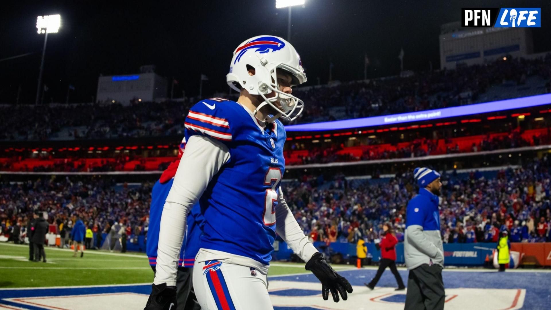 Buffalo Bills kicker Tyler Bass (2) walks off the field after missing a potential game-tying field goal against the Kansas City Chiefs.