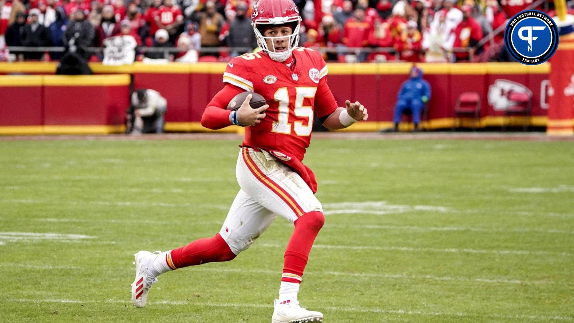 Kansas City Chiefs QB Patrick Mahomes (15) runs with the ball against the Las Vegas Raiders.