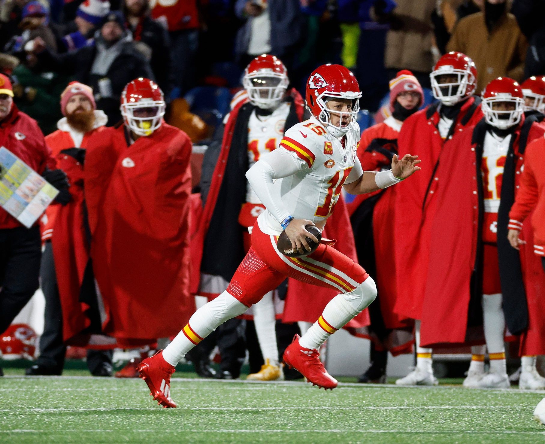 Kansas City Chiefs quarterback Patrick Mahomes (15) runs for a first down.