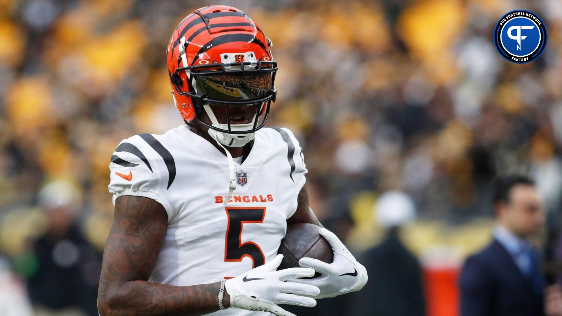 Cincinnati Bengals wide receiver Tee Higgins (5) warms up before the game against the Pittsburgh Steelers at Acrisure Stadium.