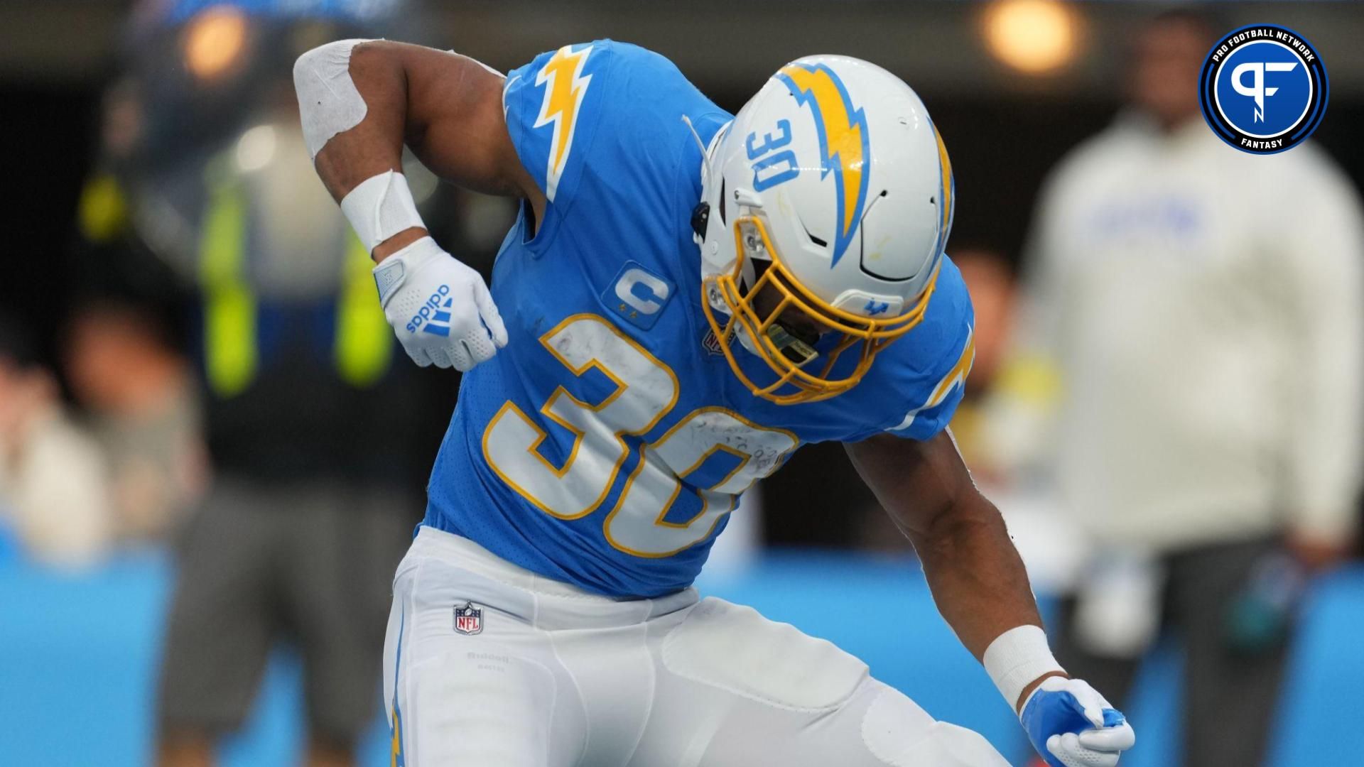 Los Angeles Chargers running back Austin Ekeler (30) celebrates after a touchdown against the Los Angeles Rams in the first half at SoFi Stadium.