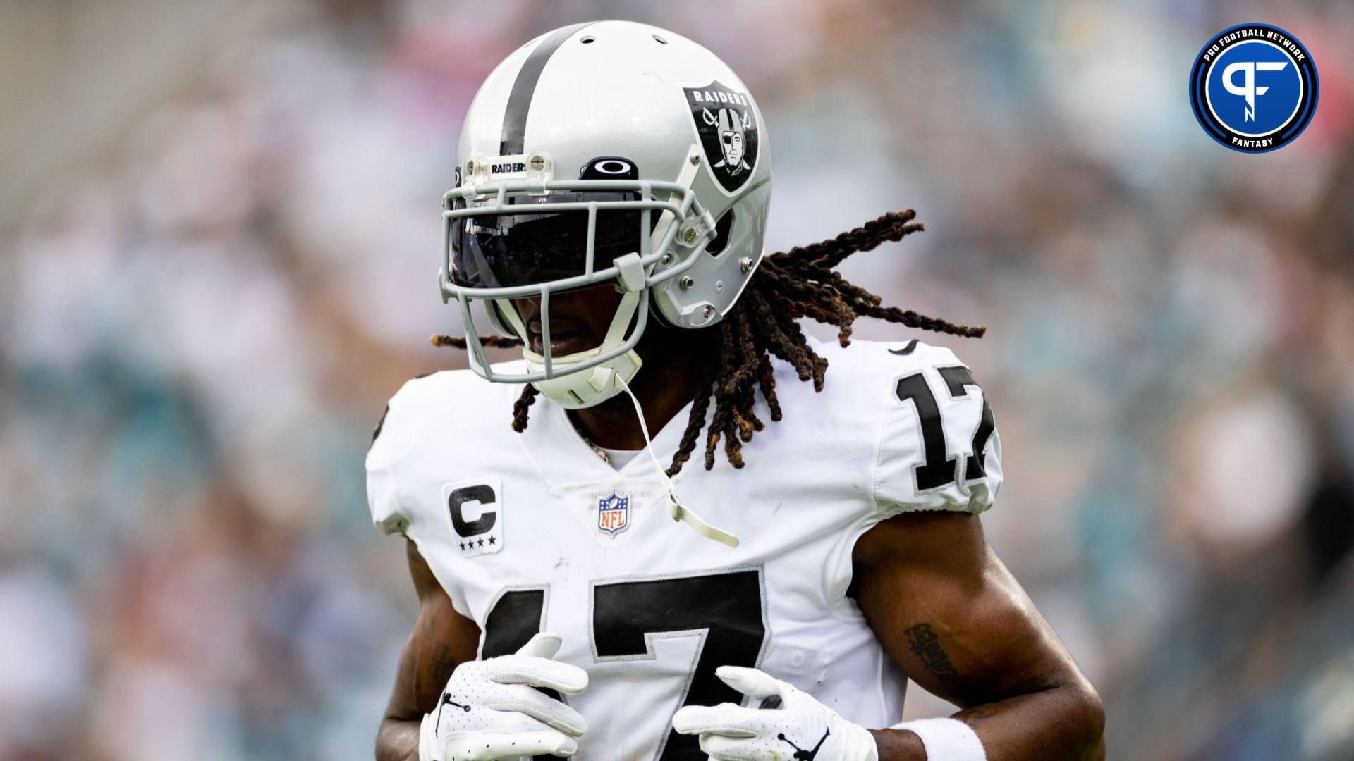 Las Vegas Raiders wide receiver Davante Adams (17) runs off the field after scoring a touchdown during the first half against the Jacksonville Jaguars at TIAA Bank Field.