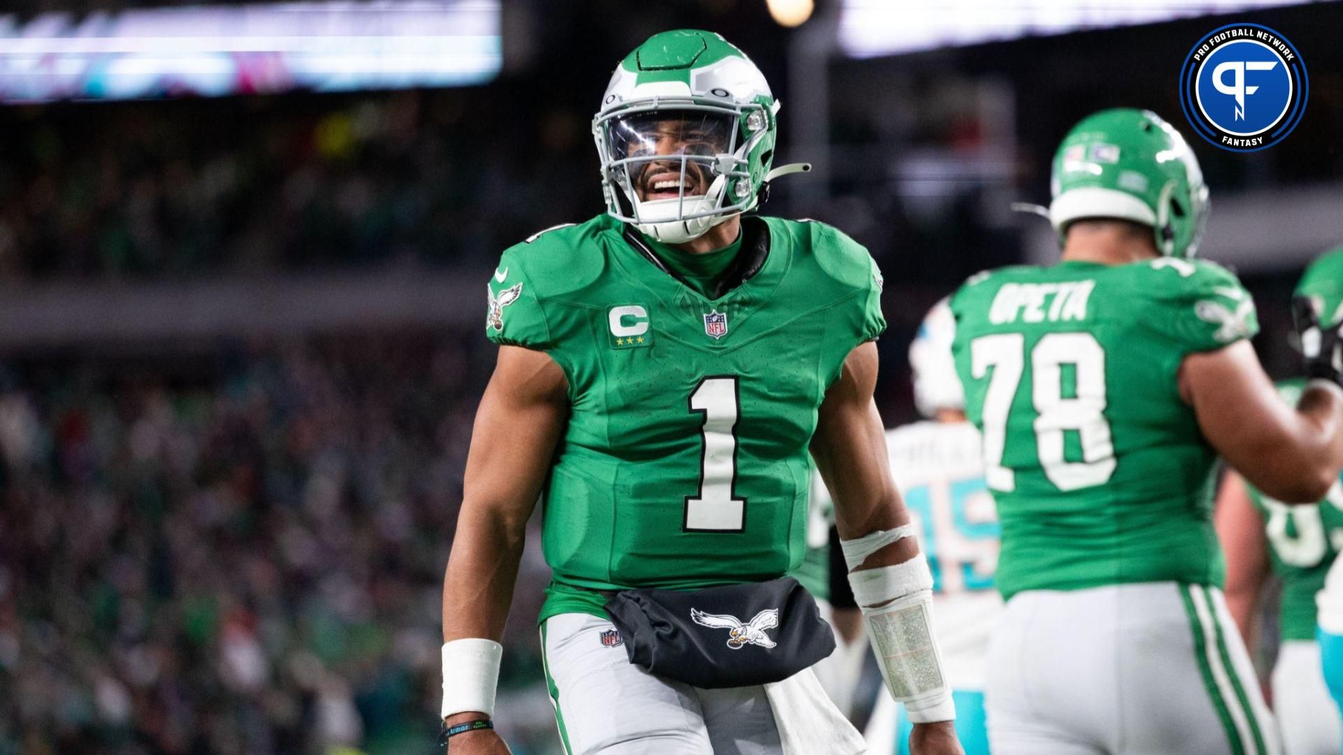 Philadelphia Eagles quarterback Jalen Hurts (1) reacts after a running back Kenneth Gainwell (not pictured) touchdown run against the Miami Dolphins during the fourth quarter at Lincoln Financial Field.