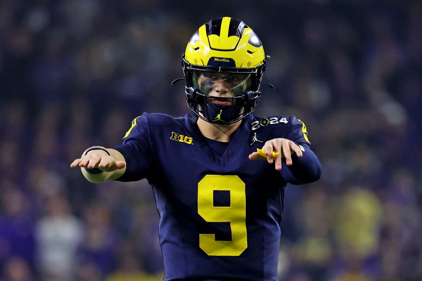 Michigan Wolverines quarterback J.J. McCarthy (9) reacts during the second quarter against the Washington Huskies in the 2024 College Football Playoff national championship game at NRG Stadium.