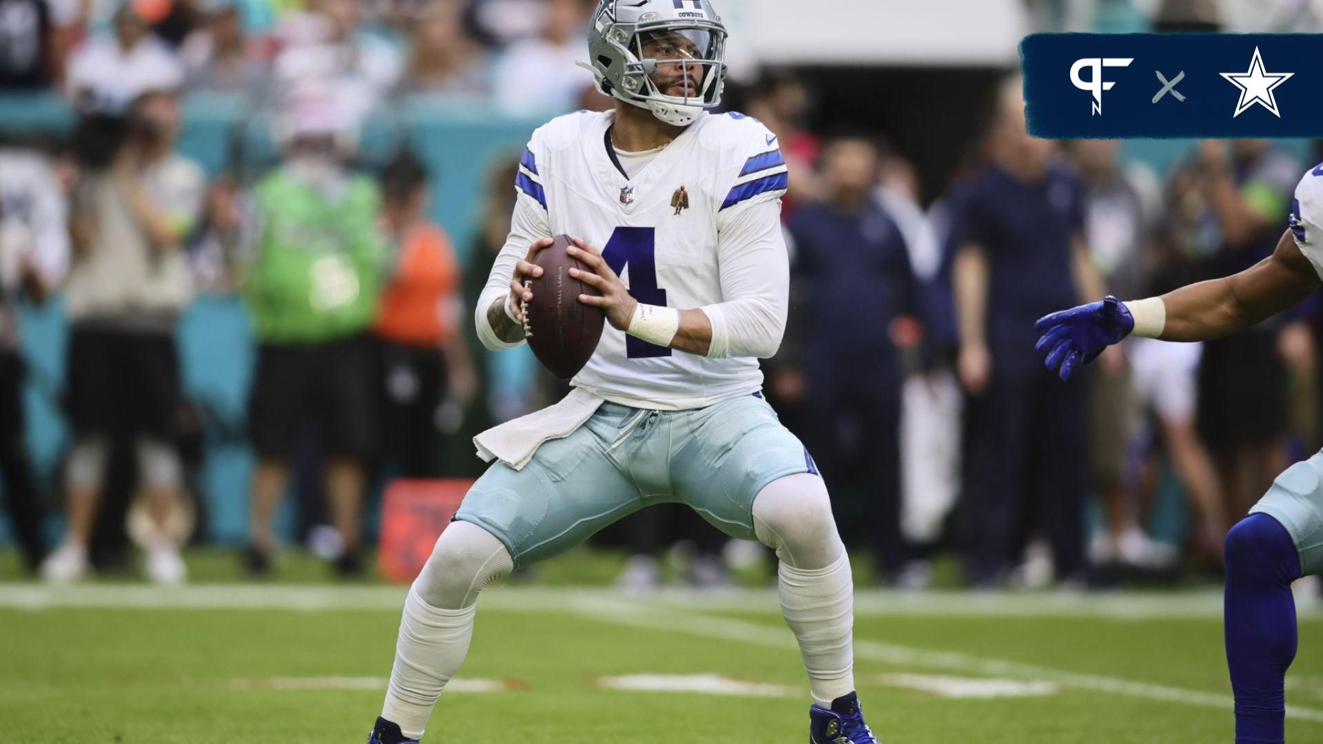 Dallas Cowboys quarterback Dak Prescott (4) looks for passing option against the Miami Dolphins during the first quarter at Hard Rock Stadium.