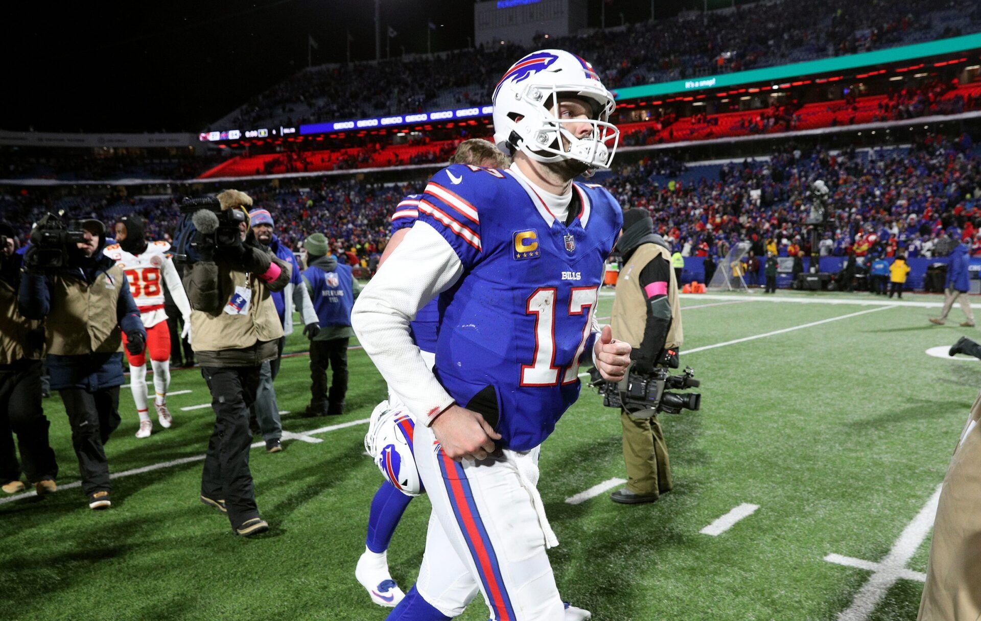 Buffalo Bills quarterback Josh Allen (17) runs off the field after a 27-24 loss to the Chiefs in the divisional round.