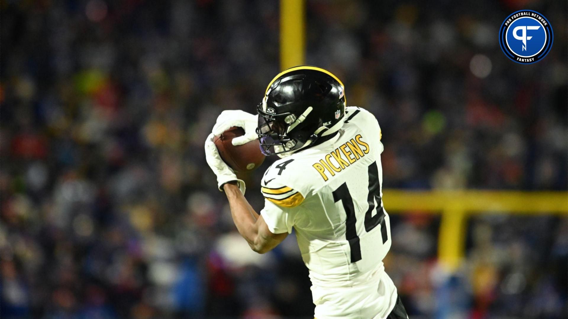 Pittsburgh Steelers wide receiver George Pickens (14) makes a catch in the first half against the Buffalo Bills in a 2024 AFC wild card game at Highmark Stadium.