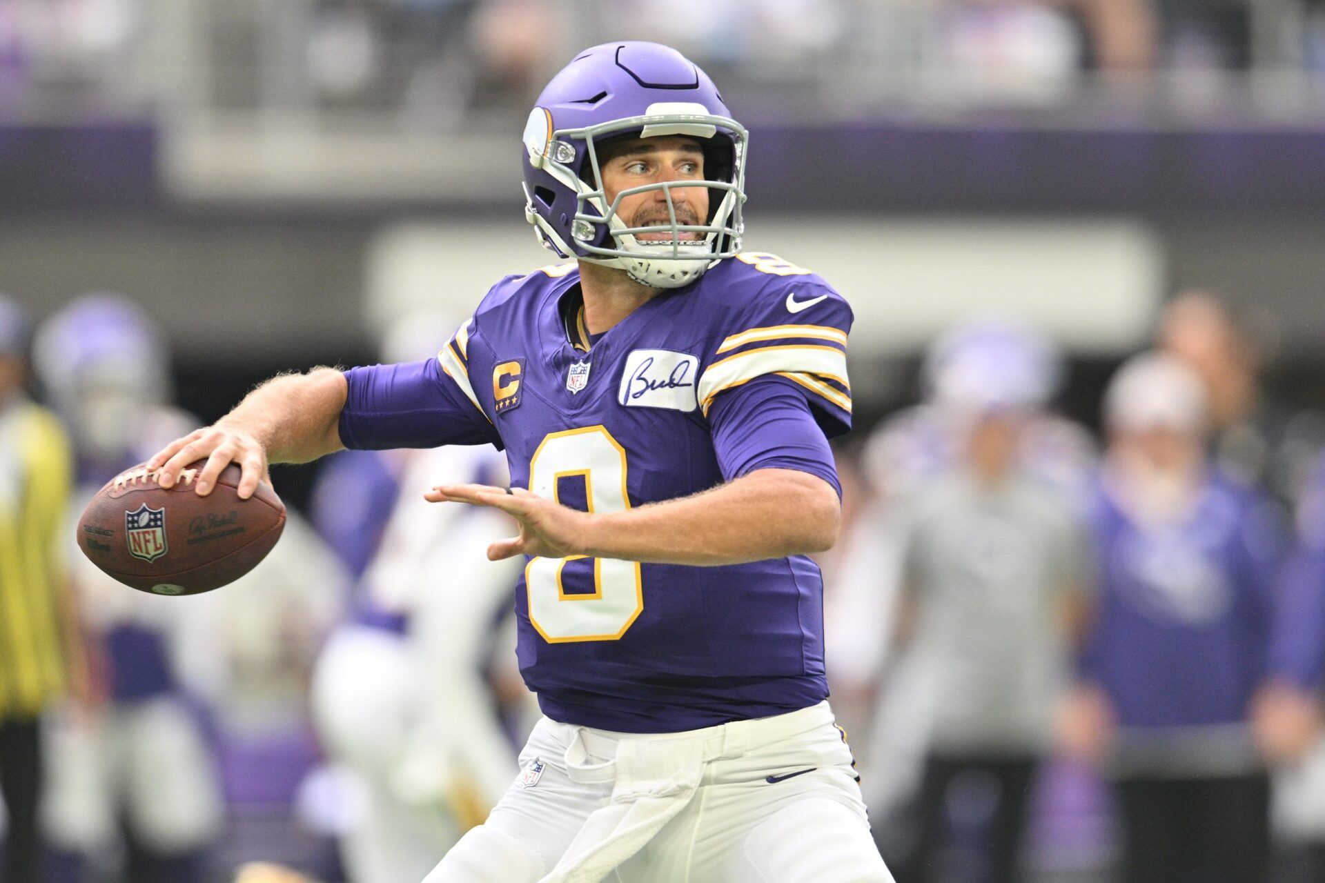 Minnesota Vikings quarterback Kirk Cousins (8) throws a pass against the Tampa Bay Buccaneers during the first quarter at U.S. Bank Stadium.