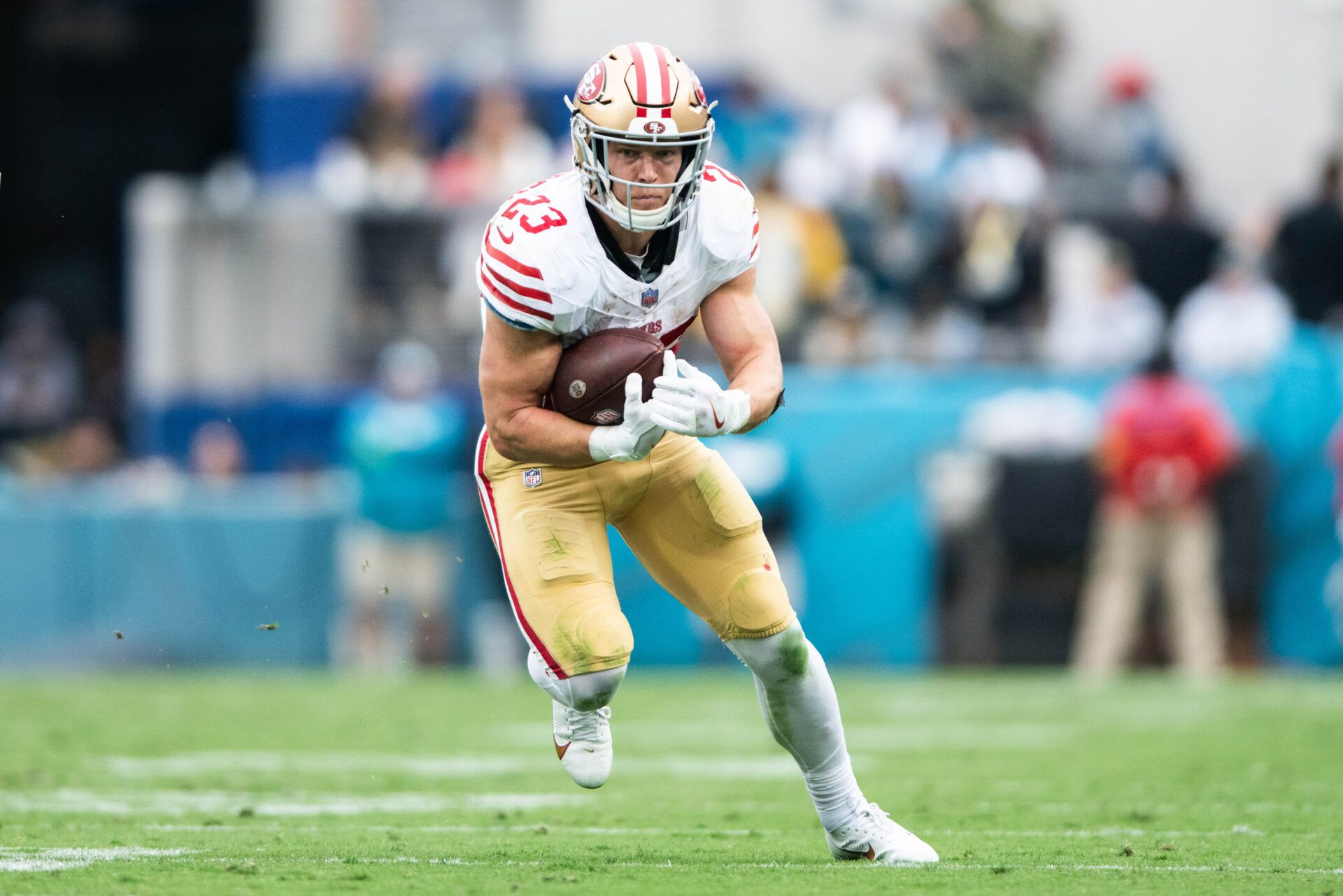 San Fransisco 49ers running back Christian McCaffrey (23) runs the ball after the catch against the Jacksonville Jaguars in the second quarter at EverBank Stadium.