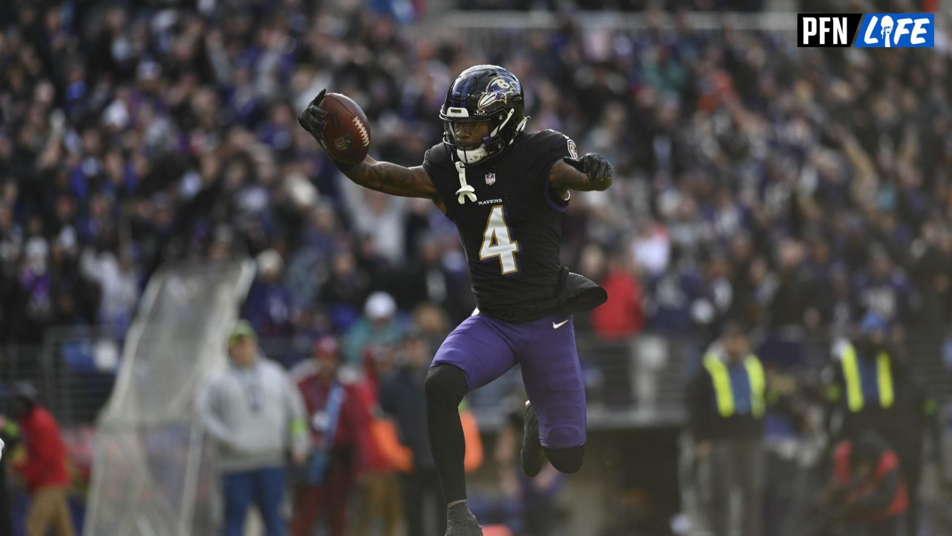 Baltimore Ravens wide receiver Zay Flowers (4) leaps into the endzone for a touchdown during the second quarter against the Miami Dolphins at M&T Bank Stadium.