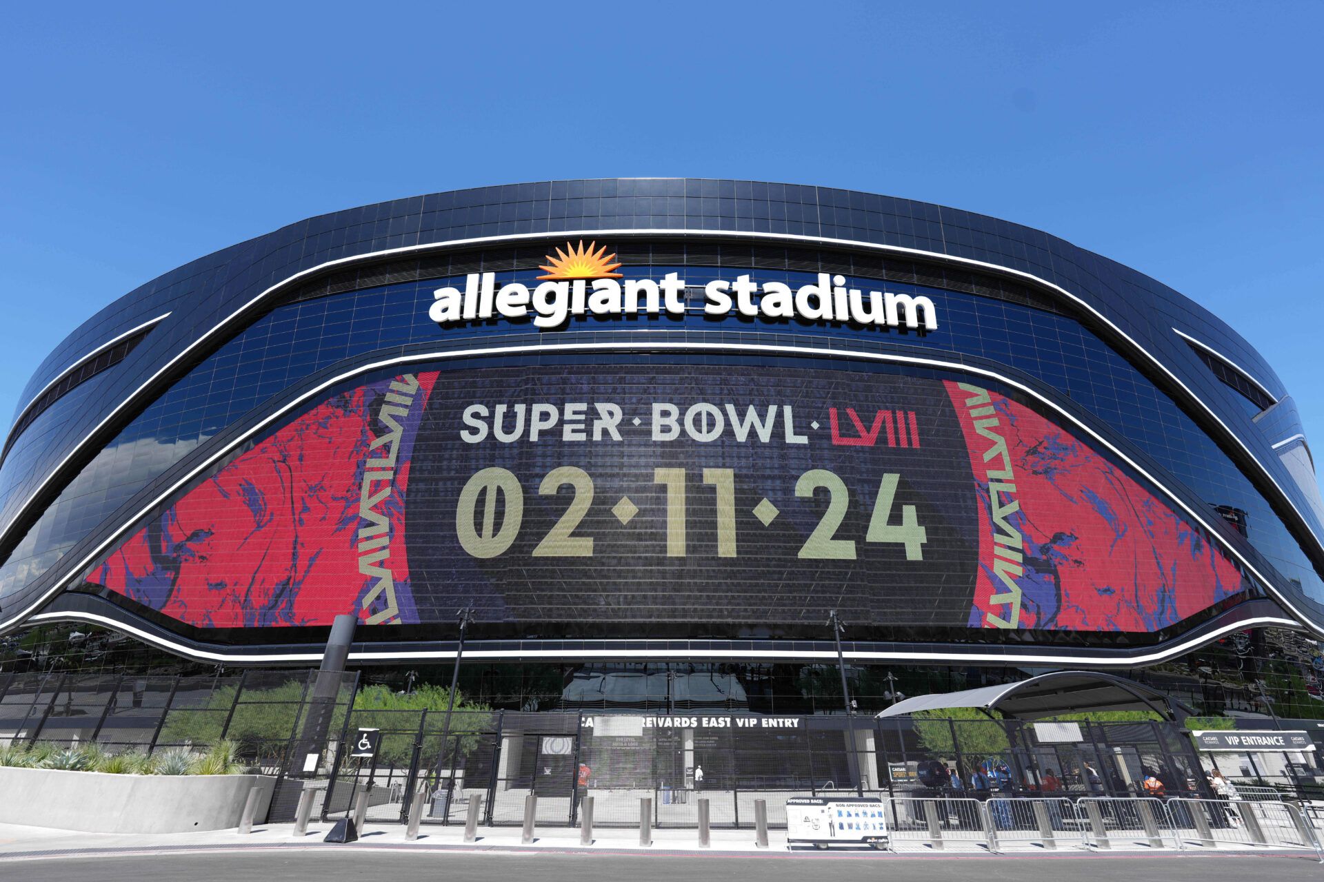 The Super Bowl LVII logo is shown on the Allegiant Stadium marquee