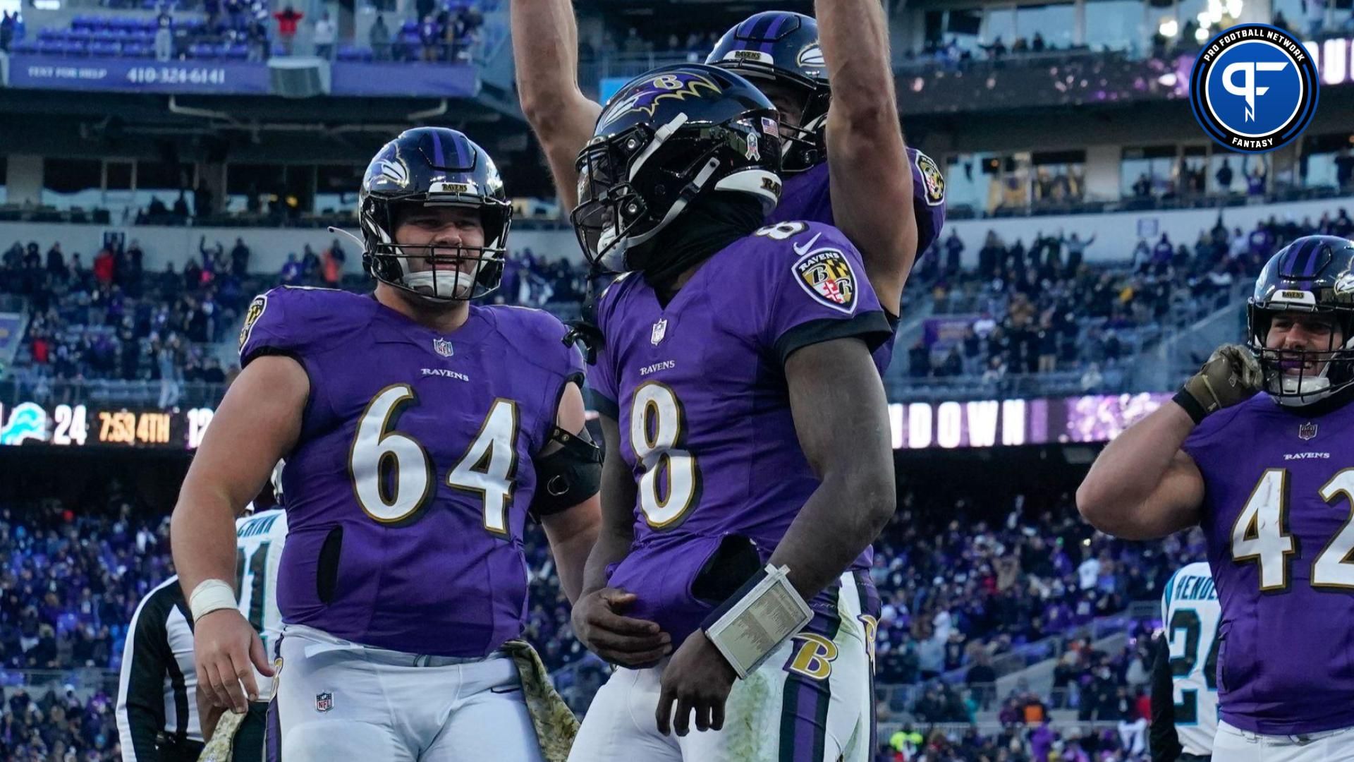 Baltimore Ravens tight end Mark Andrews (89) pretends to put a crown over the head of quarterback Lamar Jackson (8) after a touchdown in the second half at M&T Bank Stadium.