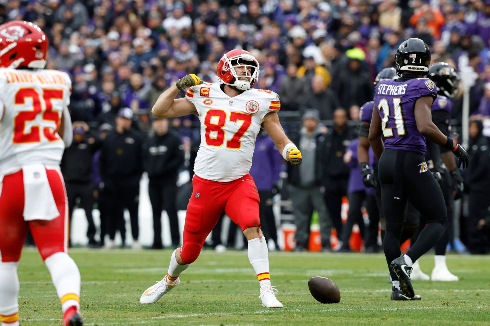 Kansas City Chiefs tight end Travis Kelce (87) celebrates on the field after a play against the Baltimore Ravens during the first half in the AFC Championship football game at M&T Bank Stadium.