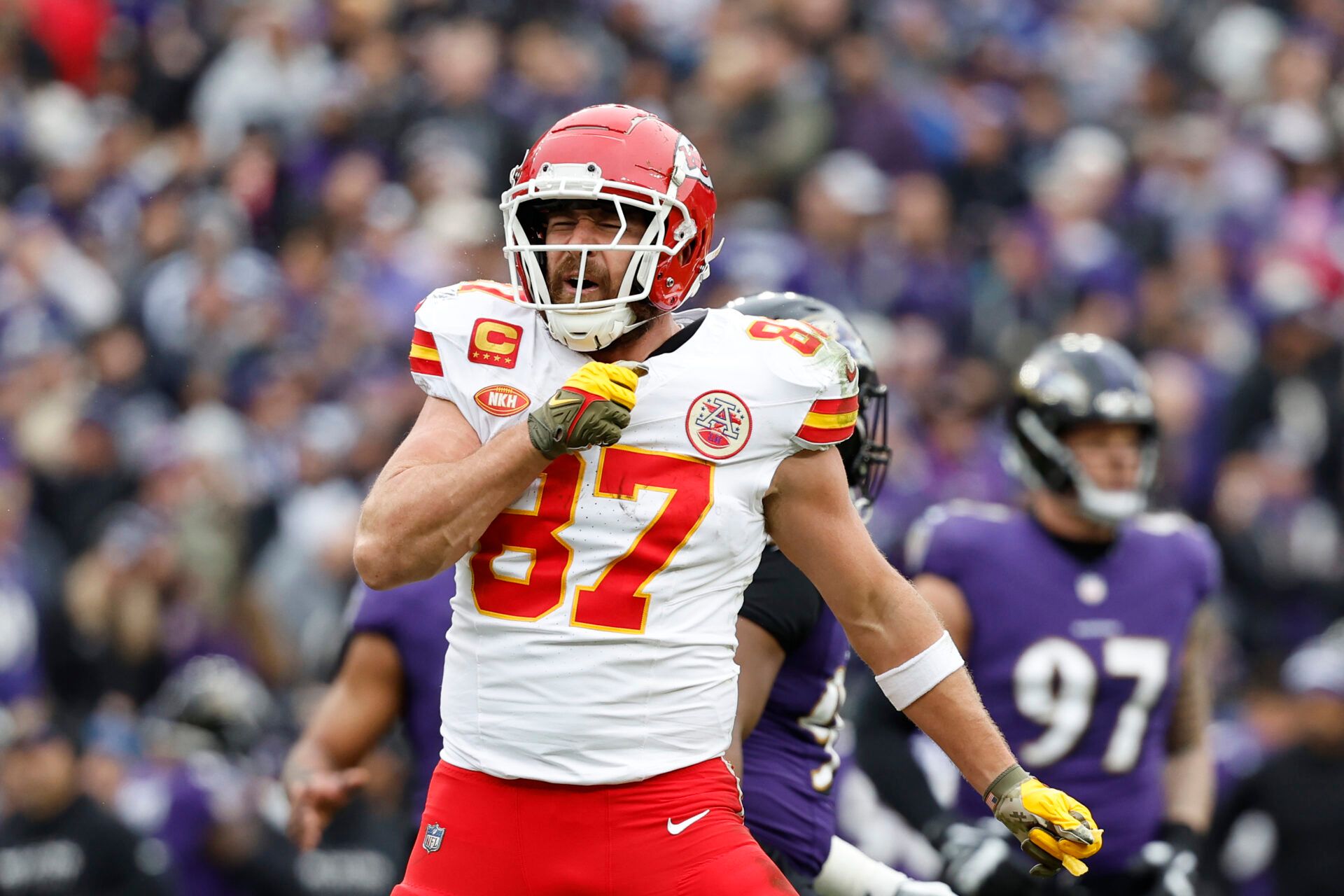 Kansas City Chiefs tight end Travis Kelce (87) celebrates after scoring a touchdown against the Baltimore Ravens during the first half in the AFC Championship football game at M&T Bank Stadium.