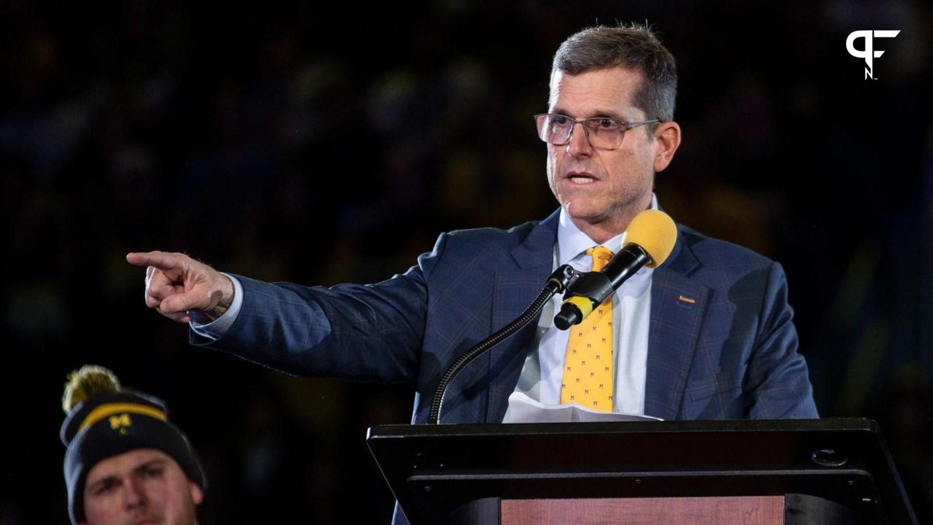 Michigan head coach Jim Harbaugh speaks during the national championship celebration at Crisler Center.