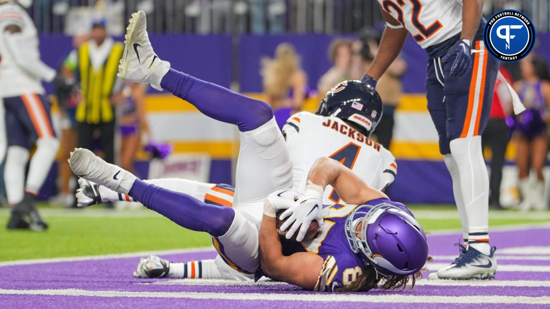 Nov 27, 2023; Minneapolis, Minnesota, USA; Minnesota Vikings tight end T.J. Hockenson (87) scores a touchdown against the Chicago Bears in the fourth quarter at U.S. Bank Stadium.