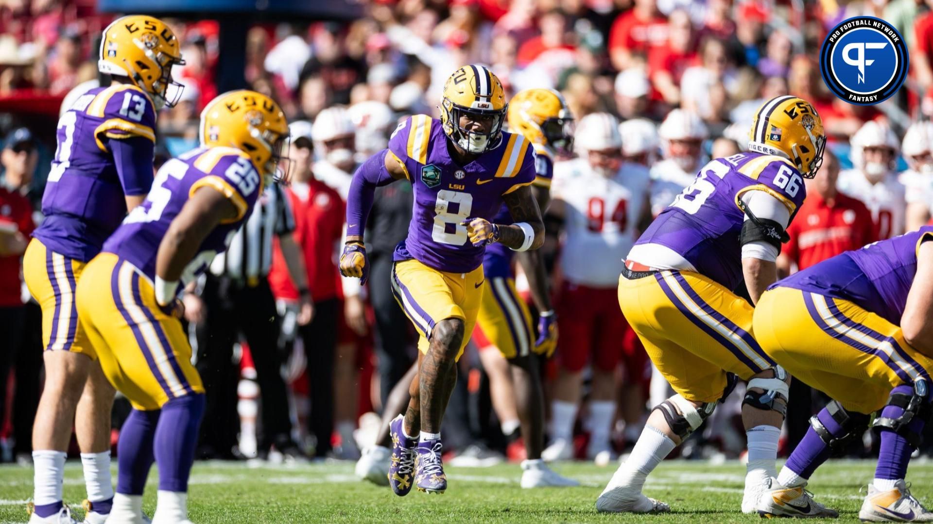 LSU Tigers wide receiver Malik Nabers (8) runs before the snap during the first half against the Wisconsin Badgers at Raymond James Stadium.