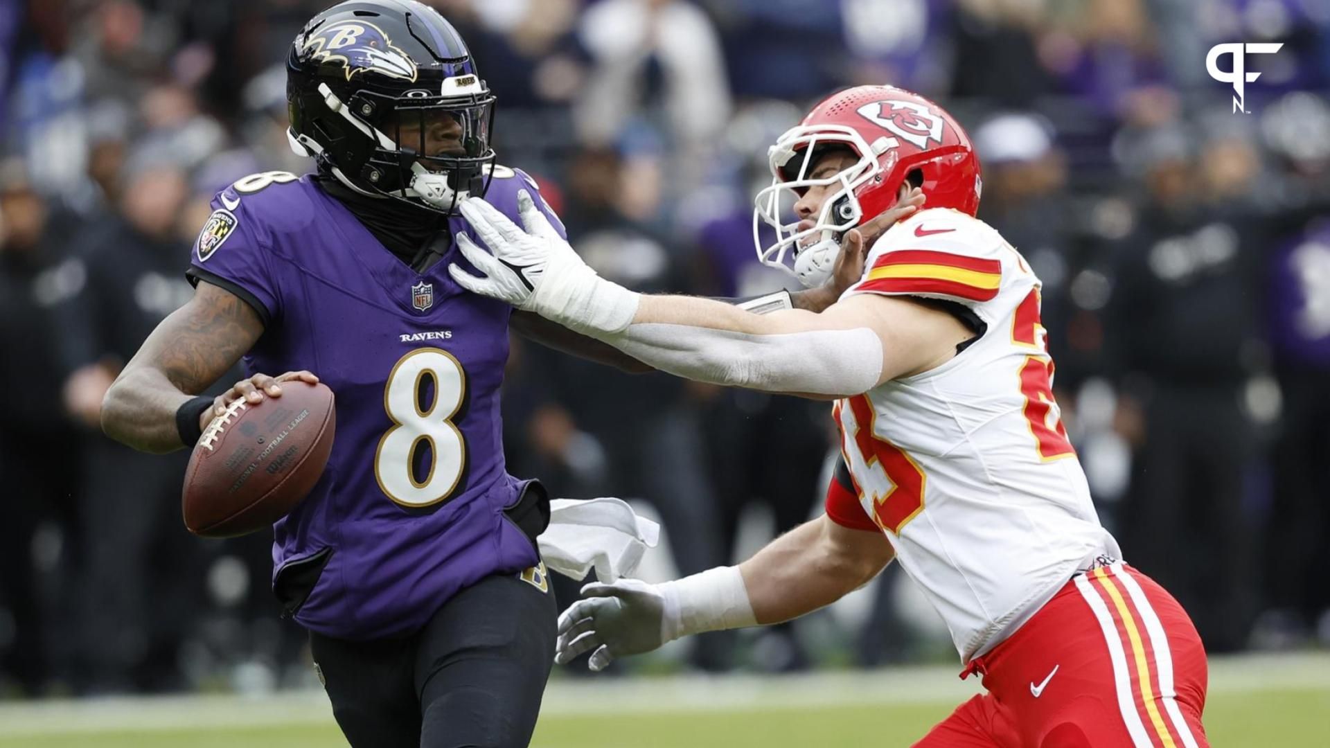 Baltimore Ravens quarterback Lamar Jackson (8) prepares to throw the ball as Kansas City Chiefs linebacker Drue Tranquill (23) defends during the first half in the AFC Championship football game at M&...