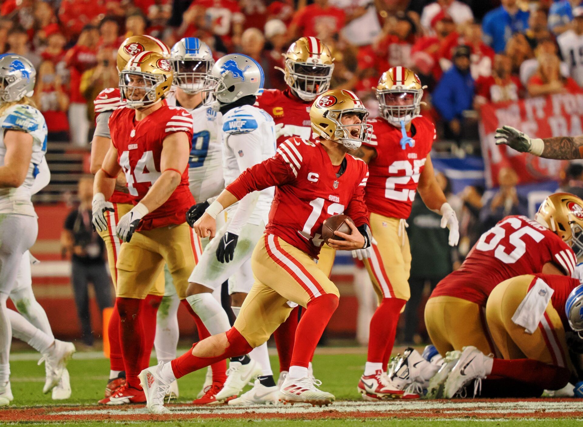 San Francisco 49ers quarterback Brock Purdy (13) celebrates after winning the NFC Championship Game against the Detroit Lions at Levi's Stadium.