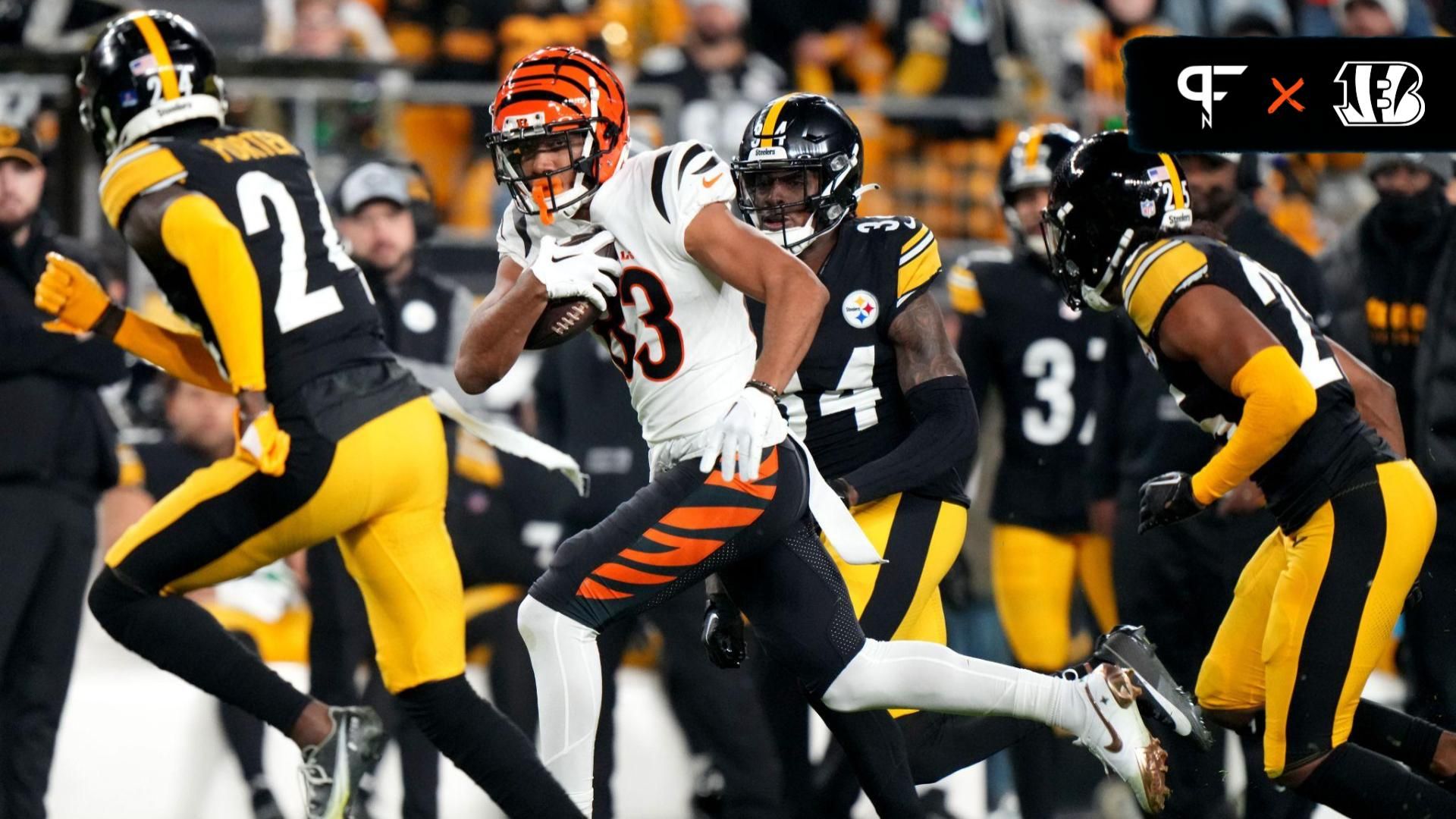 Cincinnati Bengals wide receiver Tyler Boyd (83) runs after a catch in the second quarter during a Week 16 NFL football game between the Cincinnati Bengals and the Pittsburgh Steelers at Acrisure Stadium.