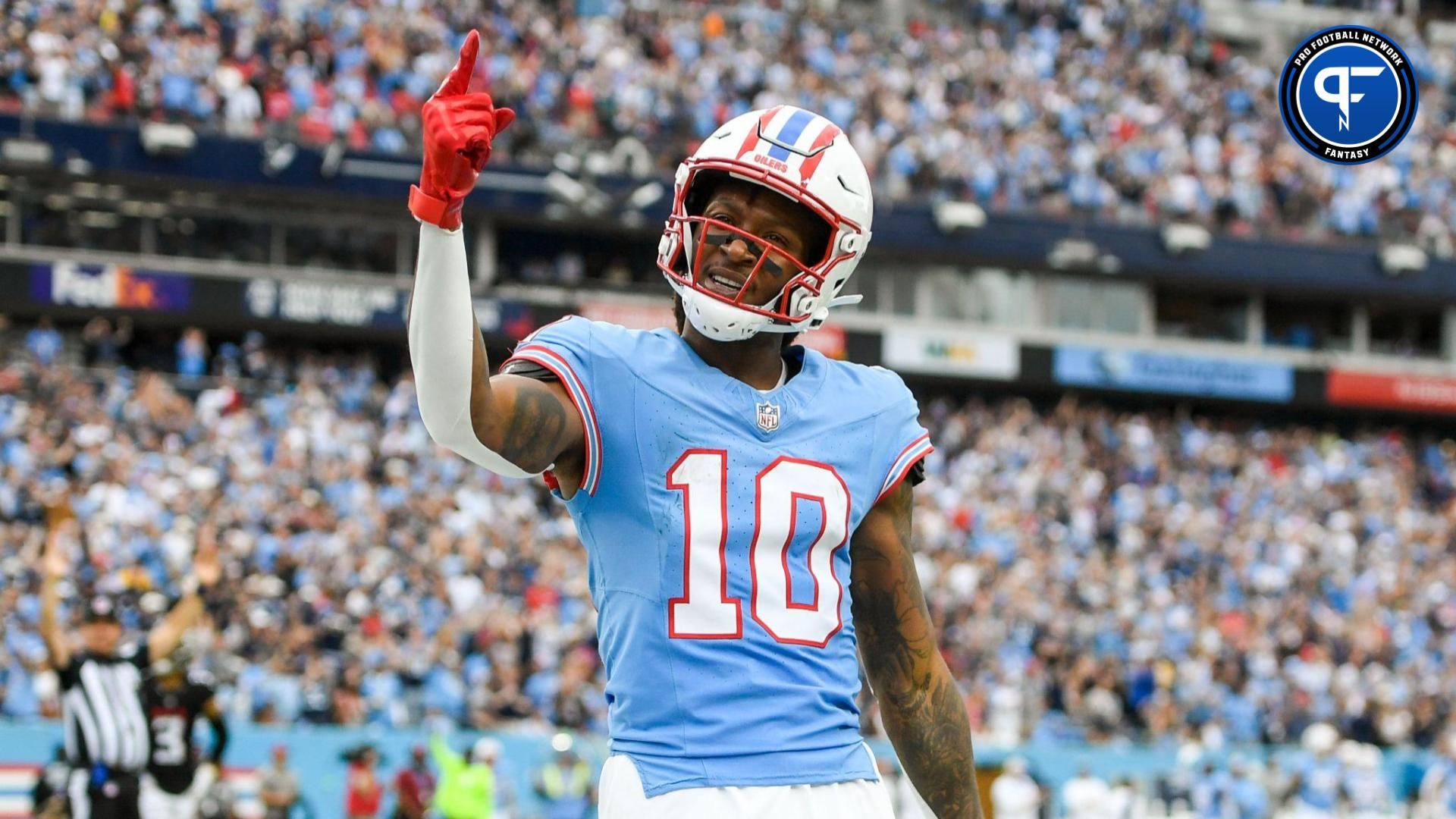 Tennessee Titans wide receiver DeAndre Hopkins (10) celebrates his third touchdown of the game against the Atlanta Falcons during the second half at Nissan Stadium.