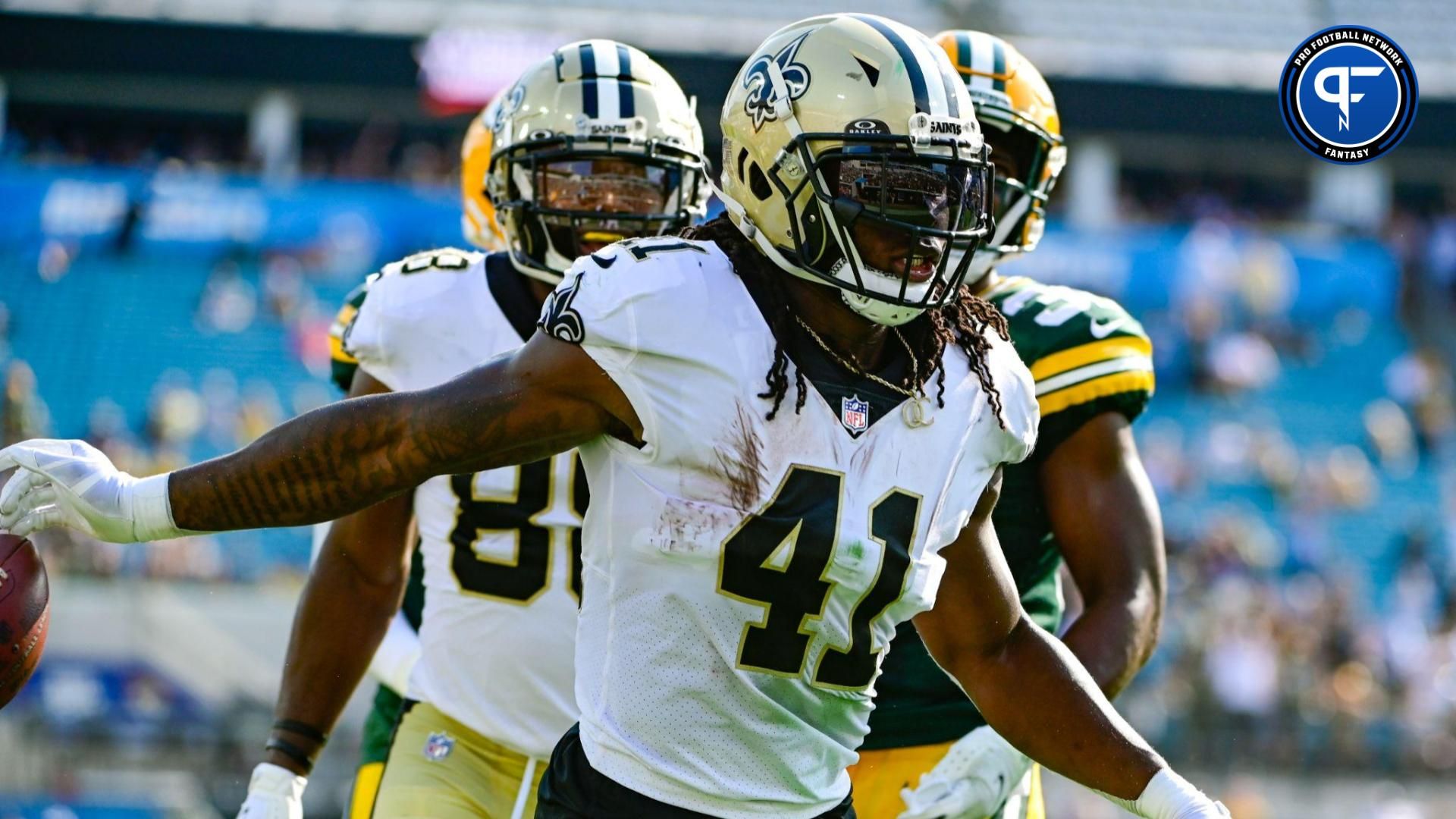 New Orleans Saints running back Alvin Kamara (41) reacts after scoring a second quarter touchdown against the Green Bay Packers at TIAA Bank Field.