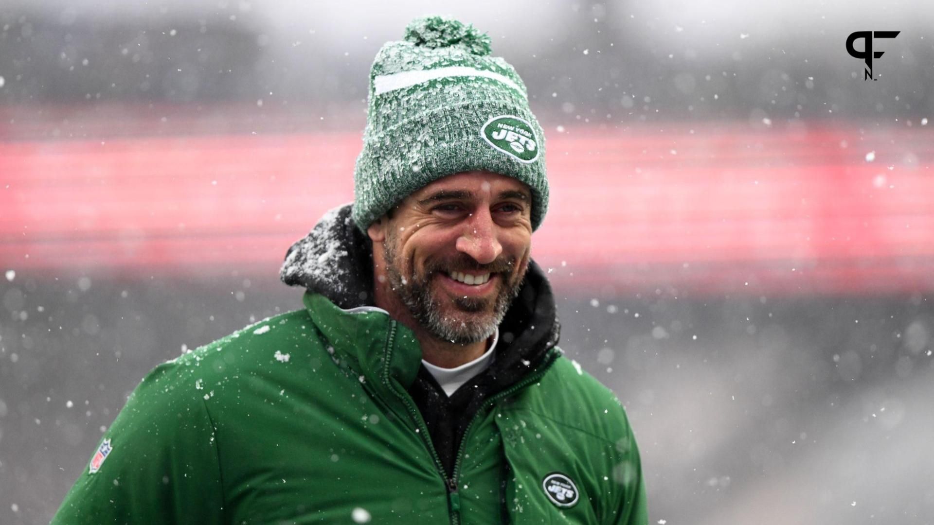 New York Jets quarterback Aaron Rodgers (8) walks off of the field before a game against the New England Patriots at Gillette Stadium.