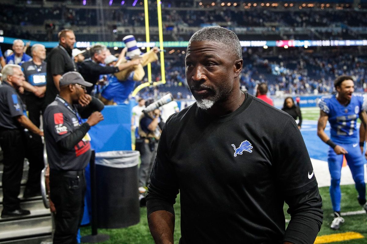 Detroit Lions defensive coordinator Aaron Glenn walks off the field after a win over the Atlanta Falcons.