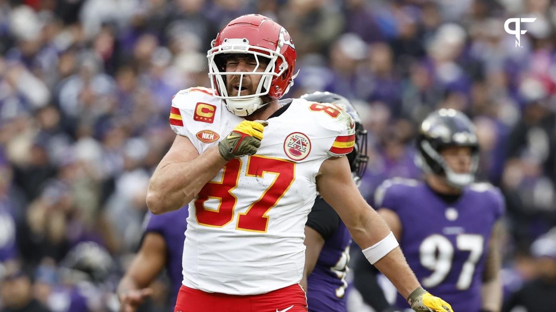 Kansas City Chiefs tight end Travis Kelce (87) celebrates after scoring a touchdown against the Baltimore Ravens during the first half in the AFC Championship football game at M&T Bank Stadium.