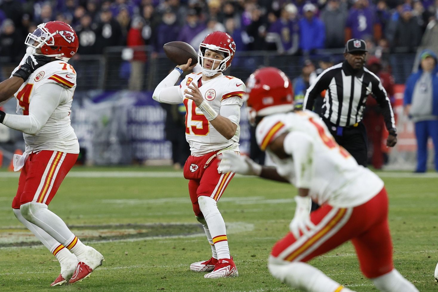 Kansas City Chiefs quarterback Patrick Mahomes (15) throws the ball against the Baltimore Ravens during the second half in the AFC Championship football game at M&T Bank Stadium.